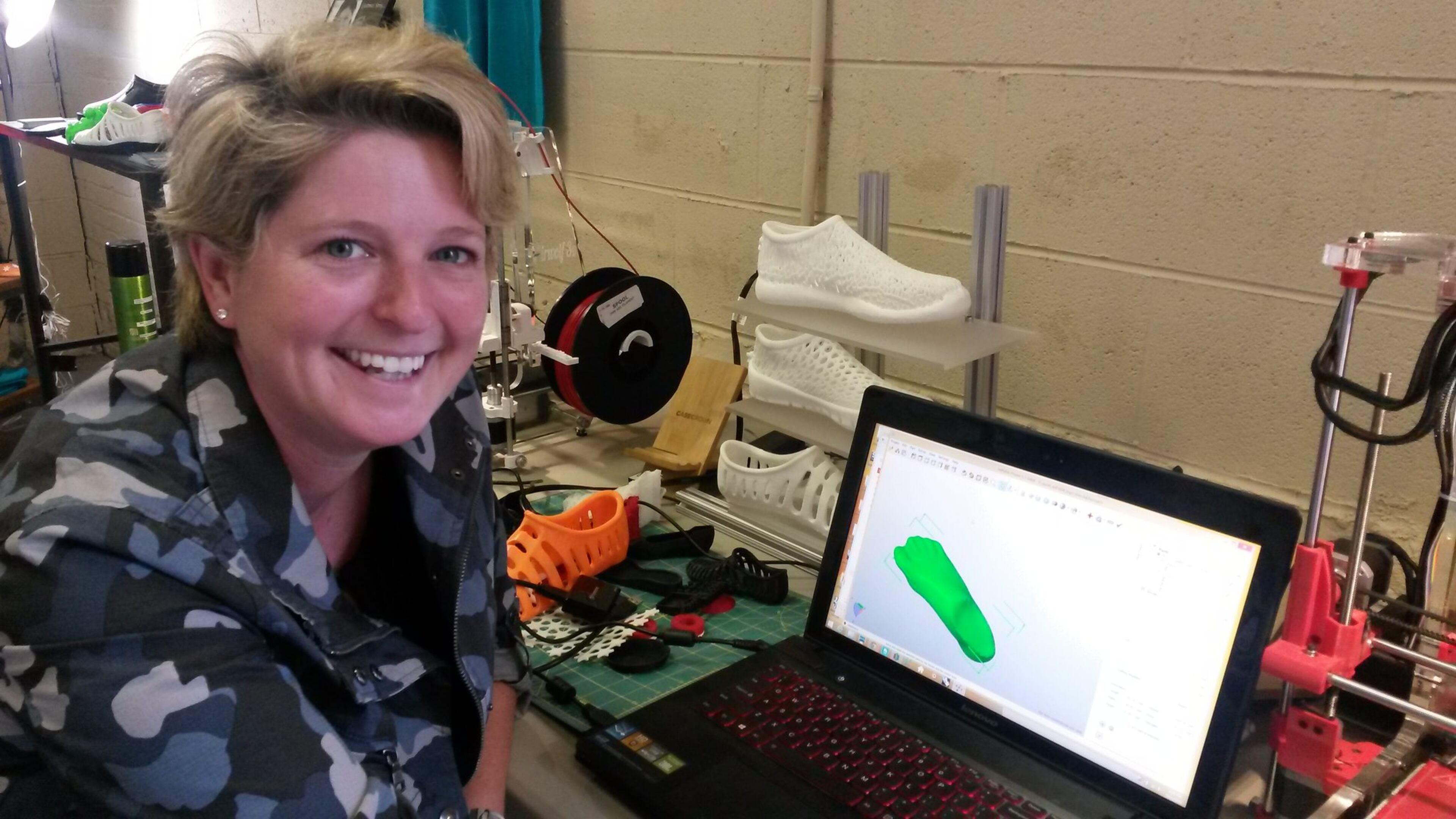 Lucy Beard moved her tech startup from California to Chattanooga for several reasons, including the area’s super fast Internet connections. Her company, Feetz, makes customized shoes using 3D printing. MATT KEMPNER / AJC