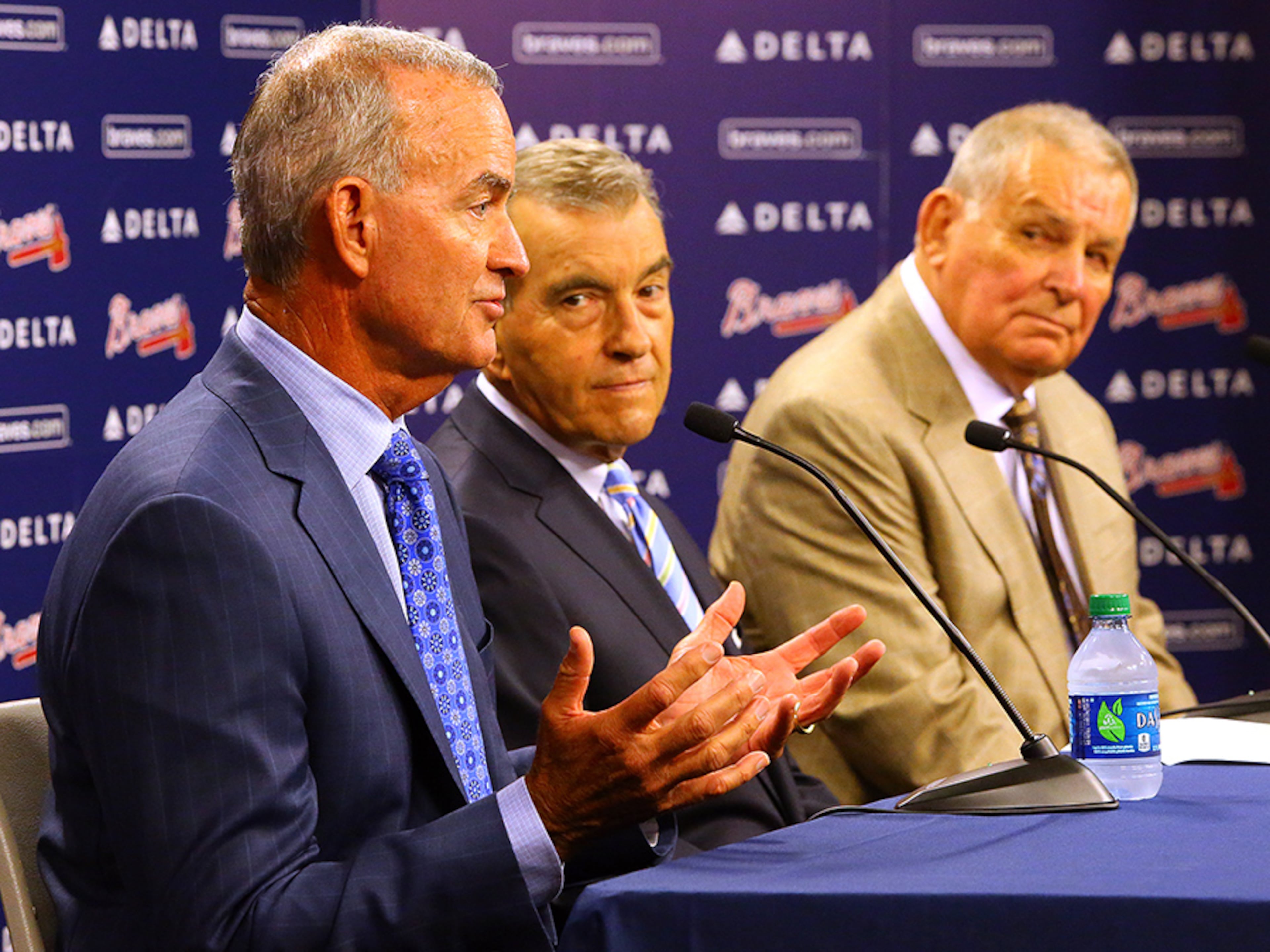 Braves interim General Manager John Hart (from left), President John Schuerholz, and longtime former manager Bobby Cox hold a press conference Monday, Sept. 22, 2014, after the team fired General Manager Frank Wren in Atlanta.