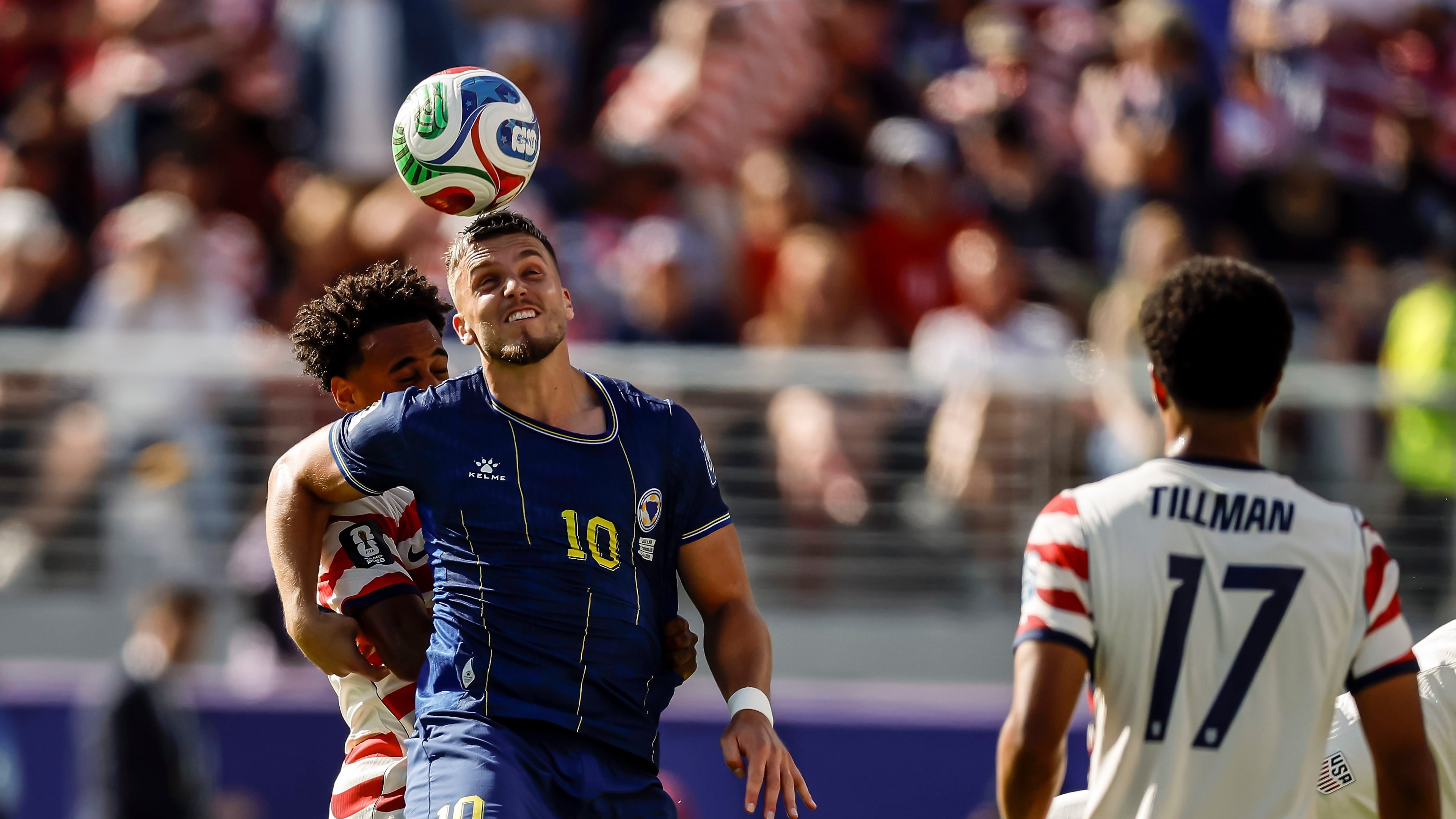 Bosnia and Herzegovina's Ermedin Demirovic (10) heads the ball in the first half of a 2026 FIFA World Cup Round of 32 match against the United States at Levi's Stadium in Santa Clara, Calif., near San Francisco, Wednesday, July 1, 2026. (Carlos Avila Gonzalez/San Francisco Chronicle via AP)