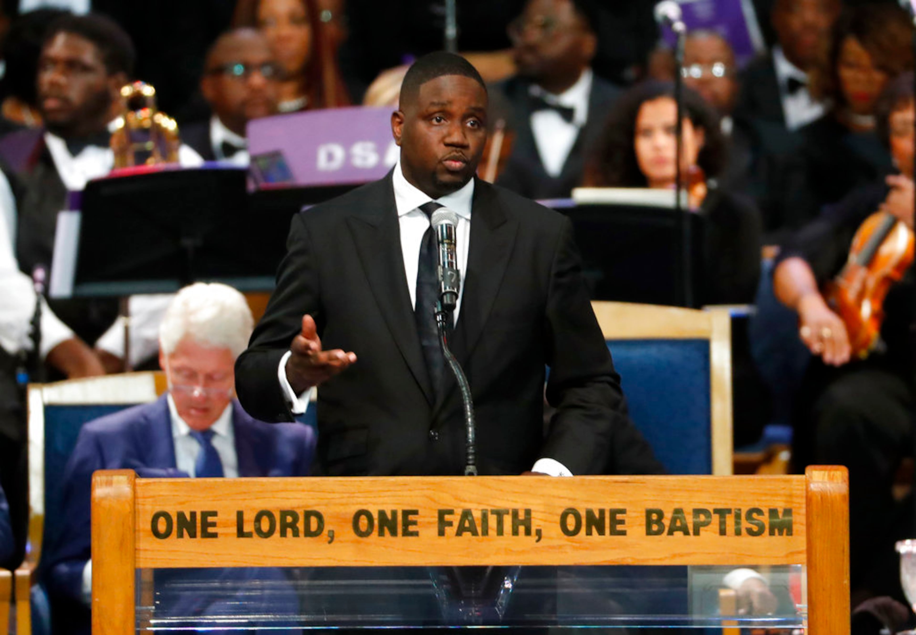 Pastor Solomon Kinloch speaks during the funeral service for Aretha Franklin at Greater Grace Temple, Friday, Aug. 31, 2018, in Detroit. Franklin died Aug. 16, 2018 of pancreatic cancer at the age of 76. (AP Photo/Paul Sancya)