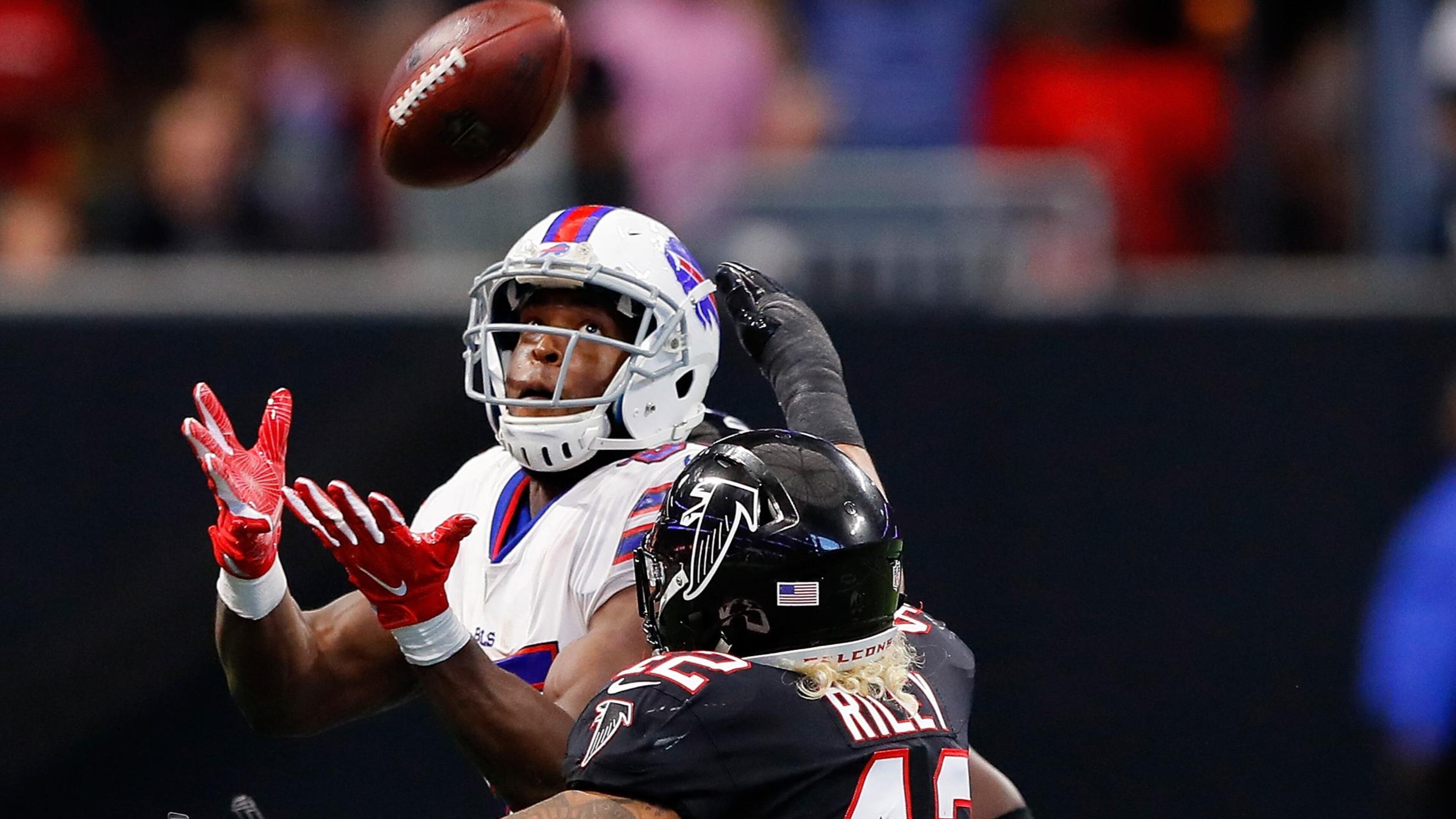 ATLANTA, GA - OCTOBER 01: Charles Clay #85 of the Buffalo Bills catches a pass against Duke Riley #42 of the Atlanta Falcons during the second half at Mercedes-Benz Stadium on October 1, 2017 in Atlanta, Georgia. (Photo by Kevin C. Cox/Getty Images)