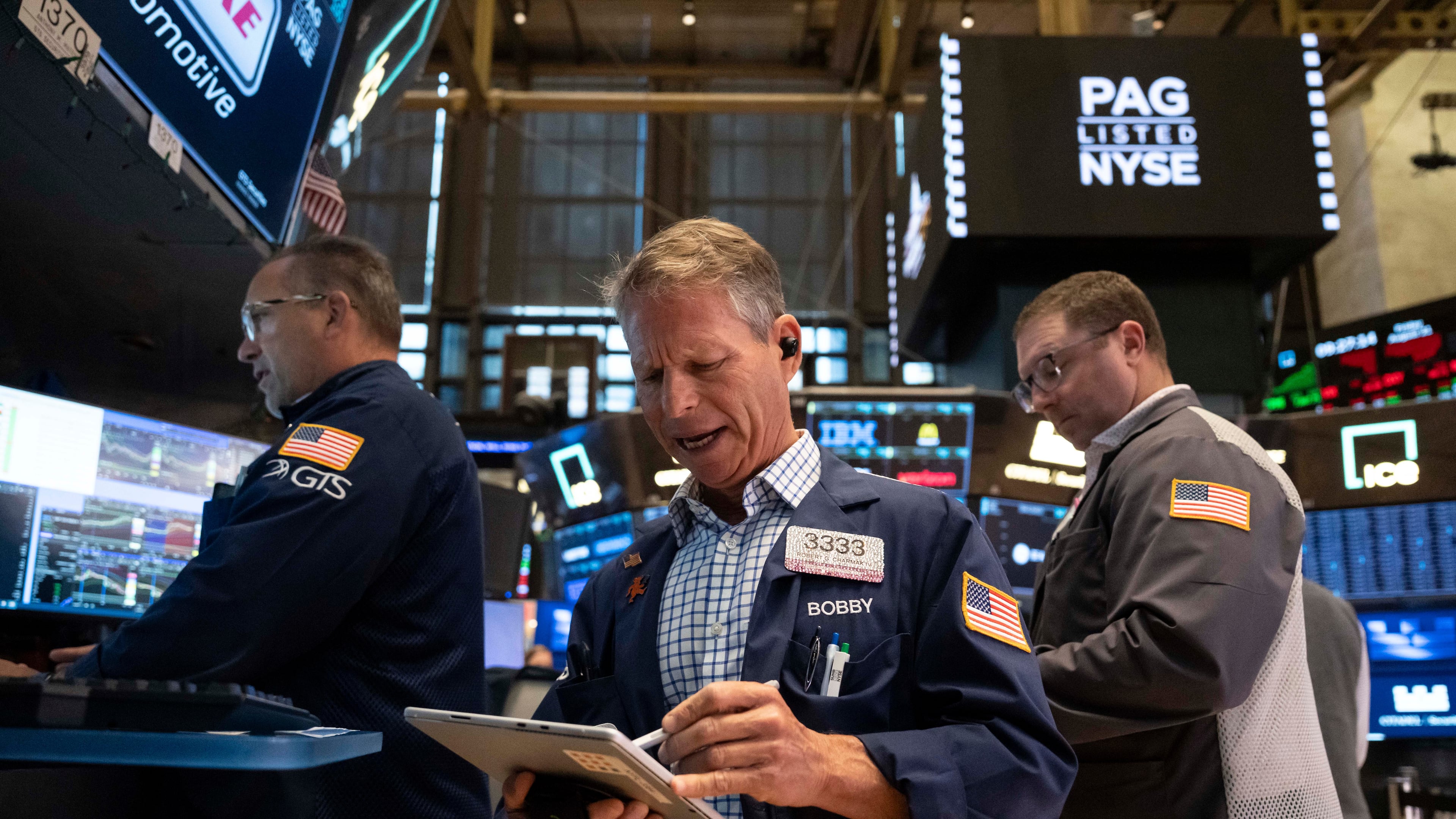 Trader Robert Charmak works on the floor of the New York Stock Exchange in New York, Friday, Aug. 21, 2026. (AP Photo/Yuki Iwamura)
