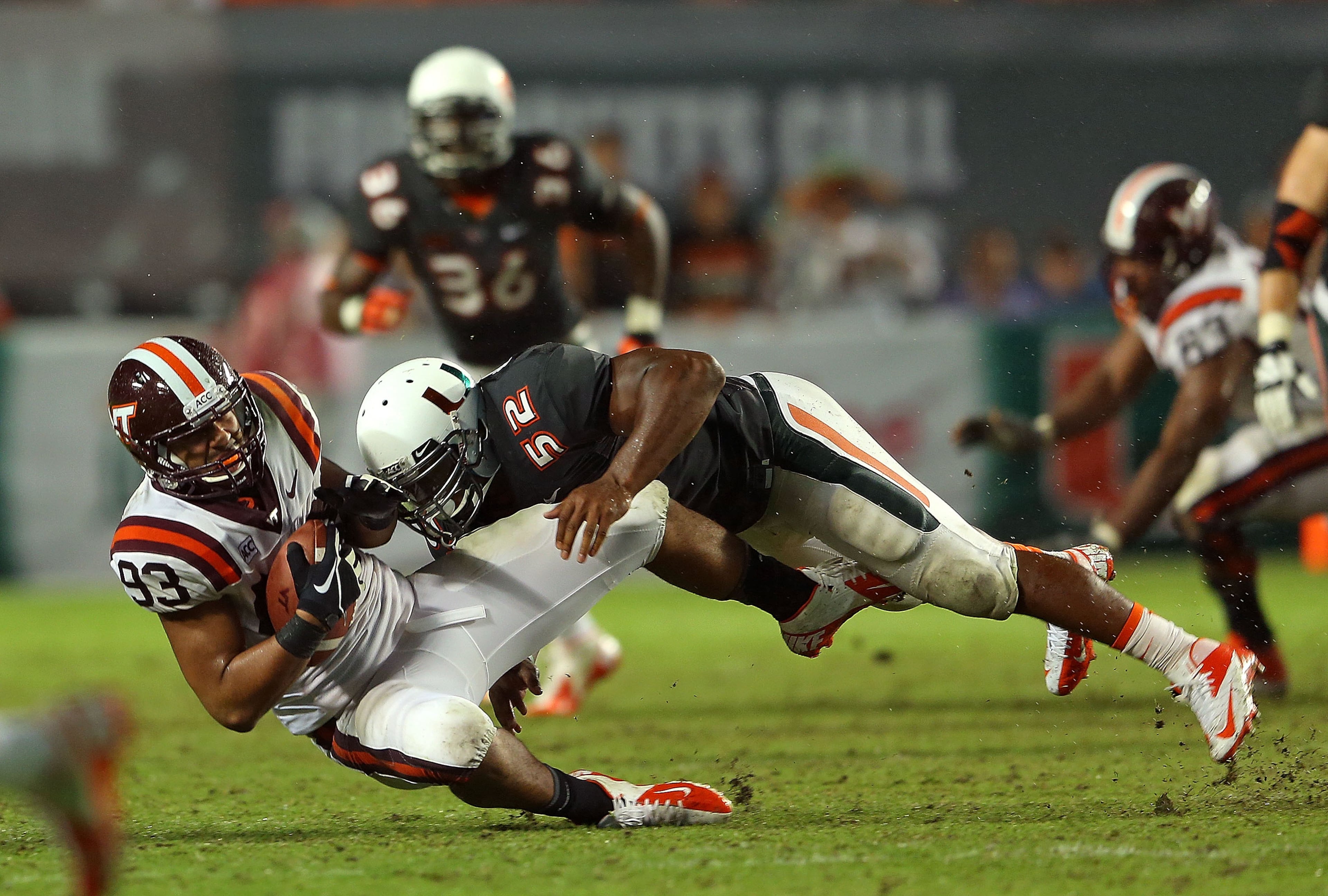 Oct. 4 vs. Miami. Linebacker Denzel Perryman of the Hurricanes tackles Kalvin Cline of Virginia Tech in a game last season. (Photo by Mike Ehrmann/Getty Images)