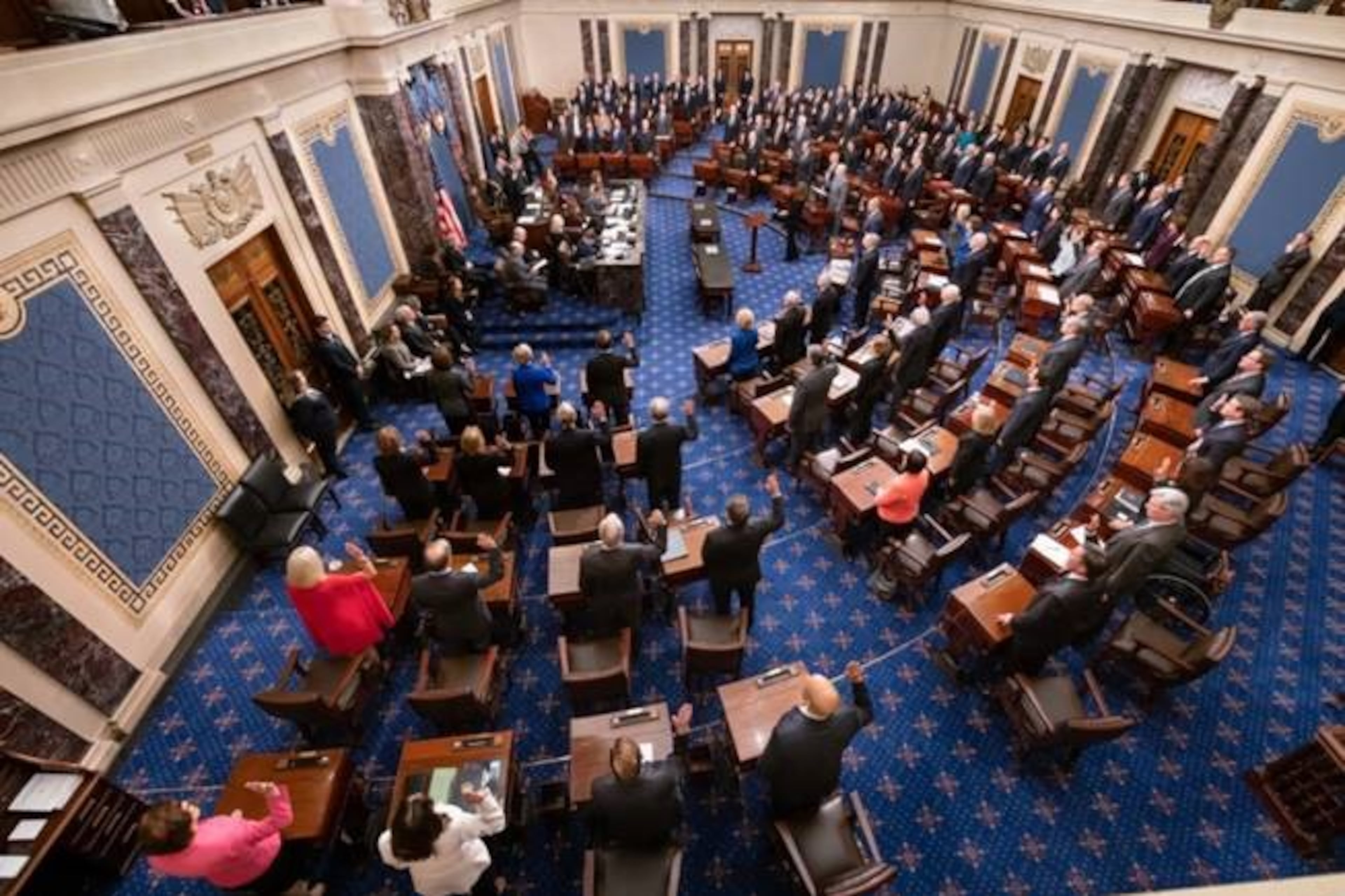 U.S. senators being sworn in ahead of the impeachment trial of President Donald Trump on Thursday. Photograph courtesy of the U.S. Senate.