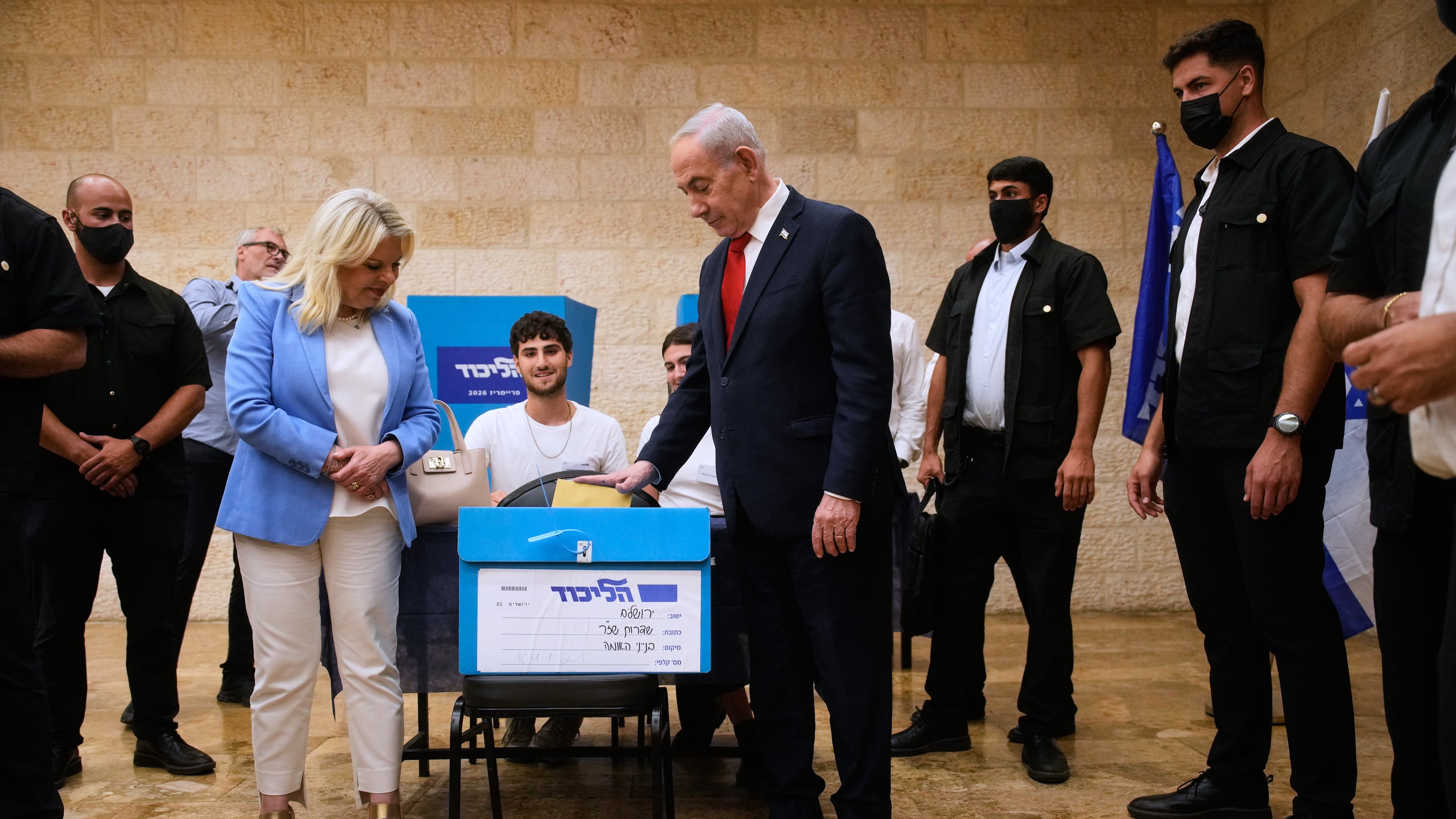 Israeli Prime Minister Benjamin Netanyahu, right, and his wife, Sara, cast their ballots in the Likud party primary elections ahead of Israel's general election in October, in Jerusalem, Monday, Aug. 17, 2026. (AP Photo/Ohad Zwigenberg, Pool)
