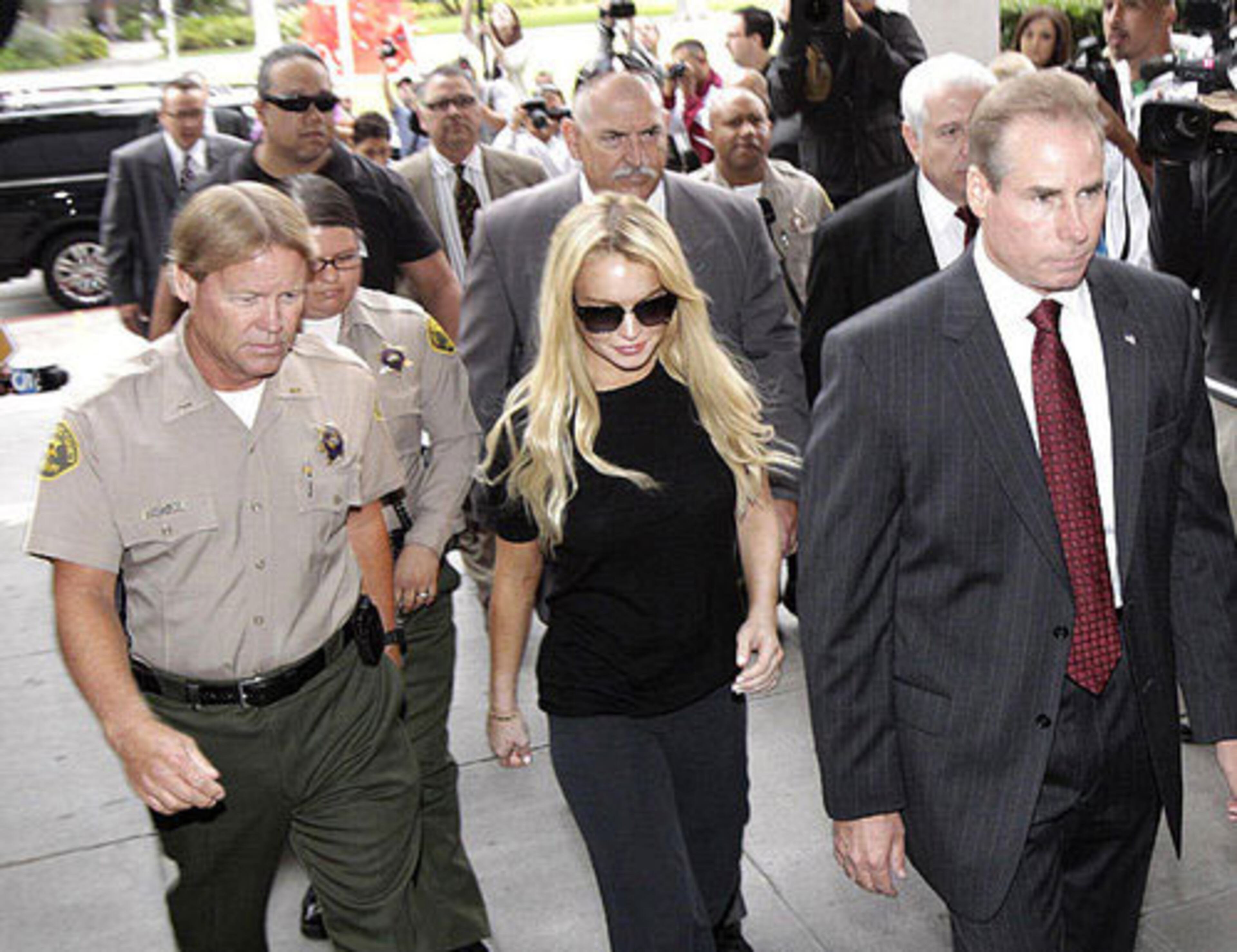 Back in black: Lindsay shows up for court in July 2010 for a probation revocation hearing.