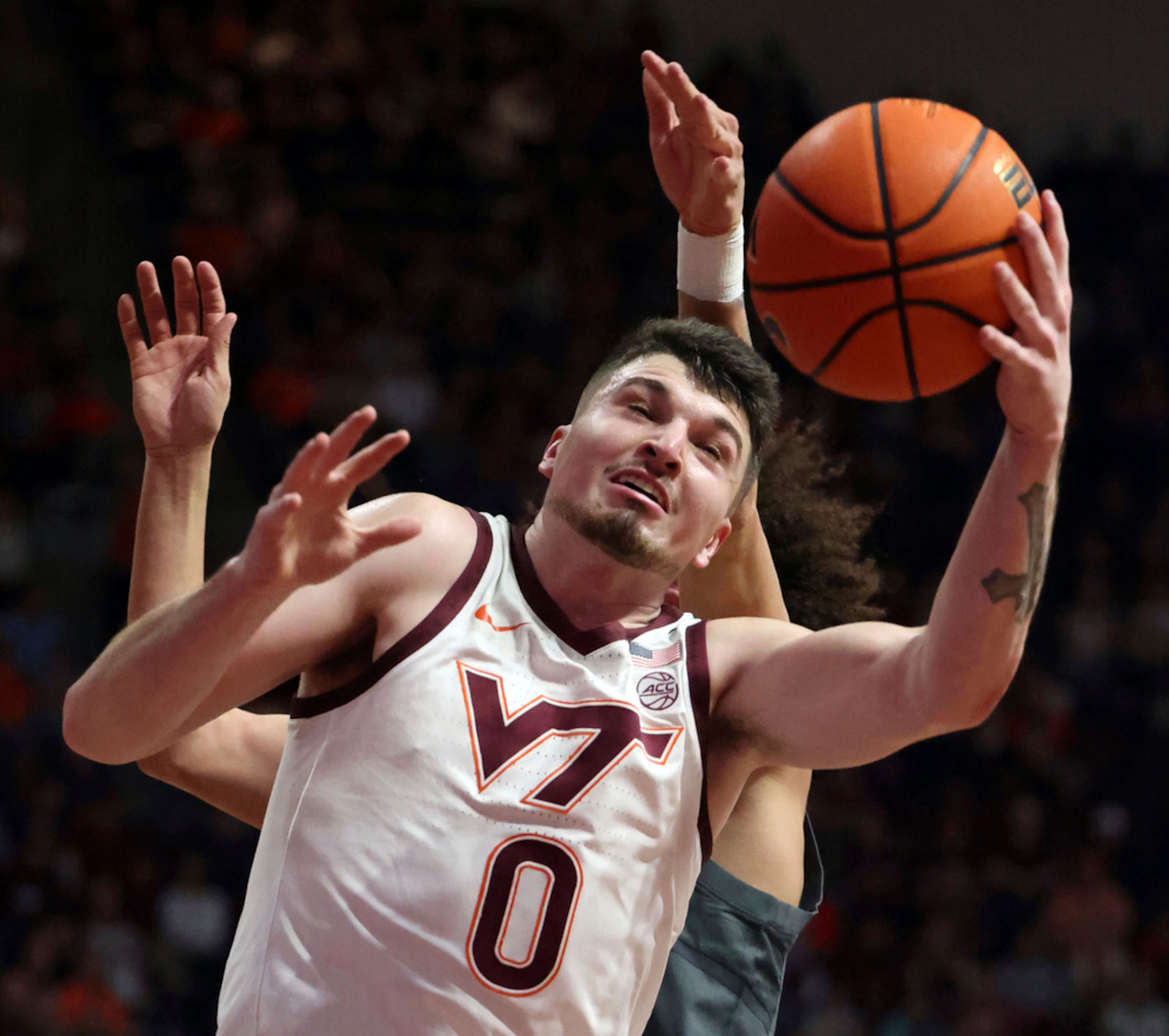 Virginia Tech's Hunter Cattoor (0) grabs a defensive rebound in the first half of an NCAA college basketball game against Georgia Tech, Saturday, Jan. 27, 2024, in Blacksburg, Va. (Matt Gentry/The Roanoke Times via AP)
