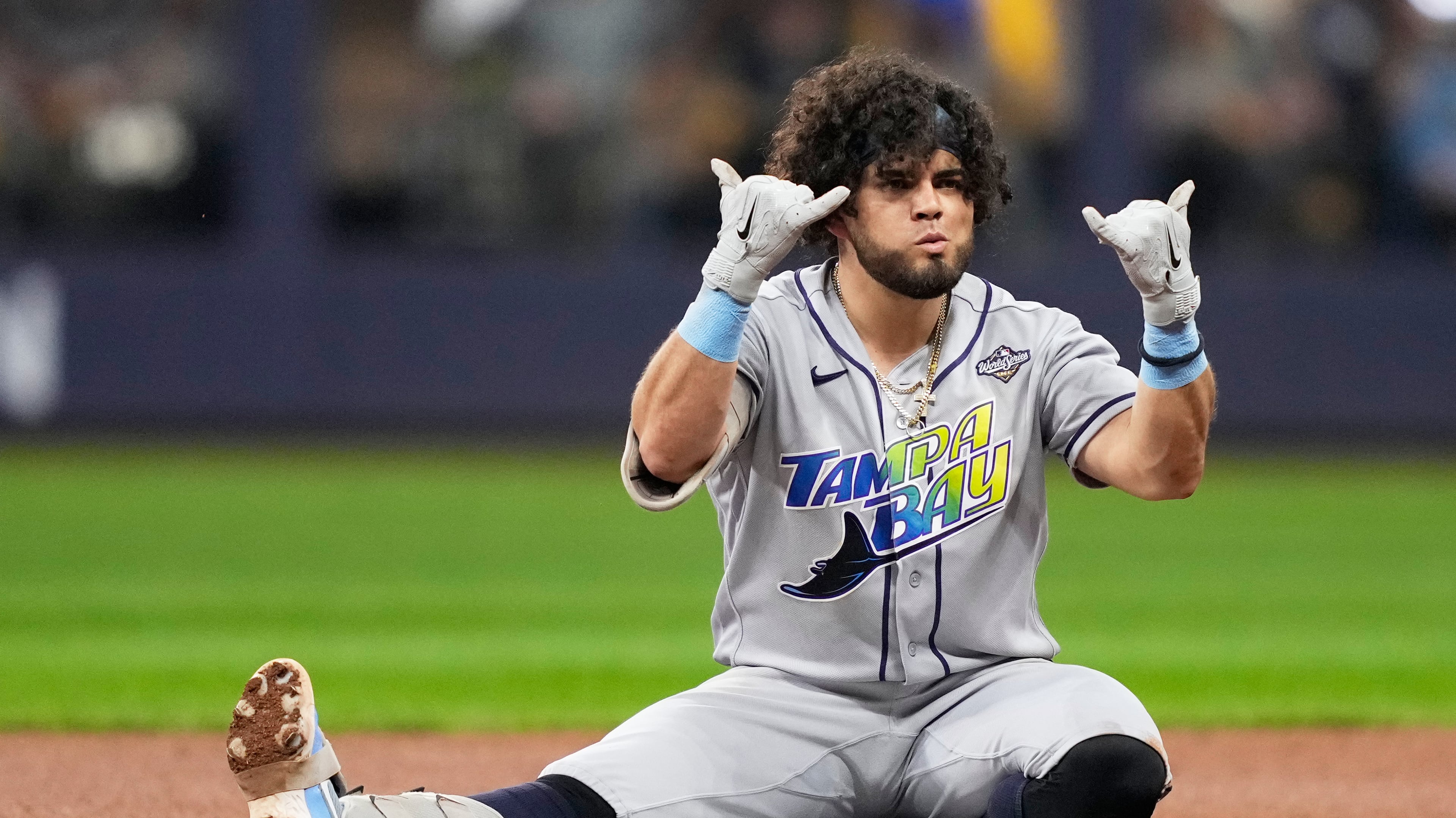 Tampa Bay Rays' Jonathan Aranda celebrates a double during the fifth inning of Game 2 of baseball's World Series, Saturday, Oct. 24, 2026, in Milwaukee, between the Milwaukee Brewers and the Tampa Bay Rays. (AP Photo/Kayla Wolf)