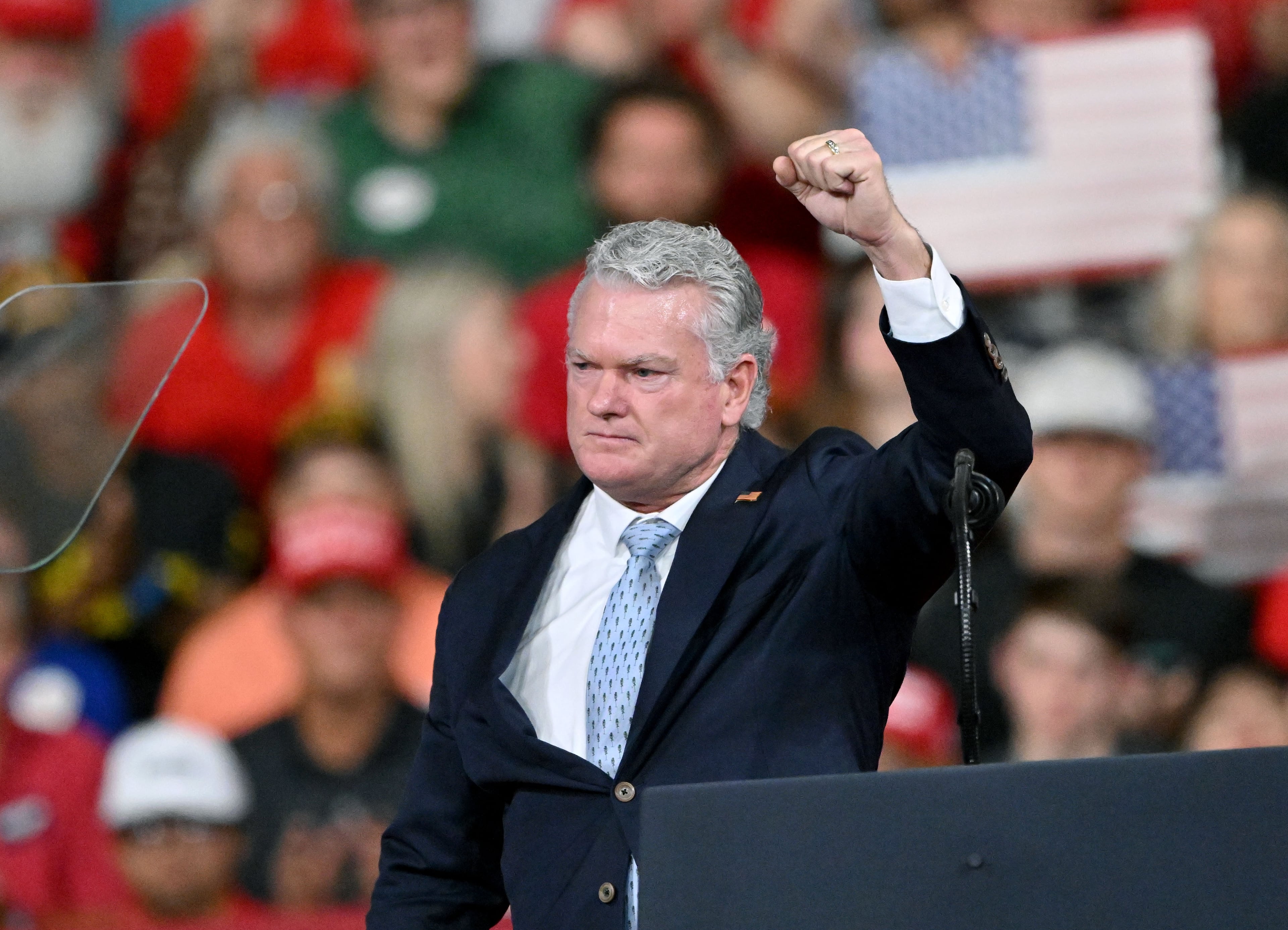 Georgia U.S. Senate candidate Rep. Mike Collins waves as he leaves the stage before President Donald Trump arrives at a midterm campaign rally at Guardian Centers on Saturday, Oct. 24, 2026, in Perry. (Hyosub Shin/AJC)