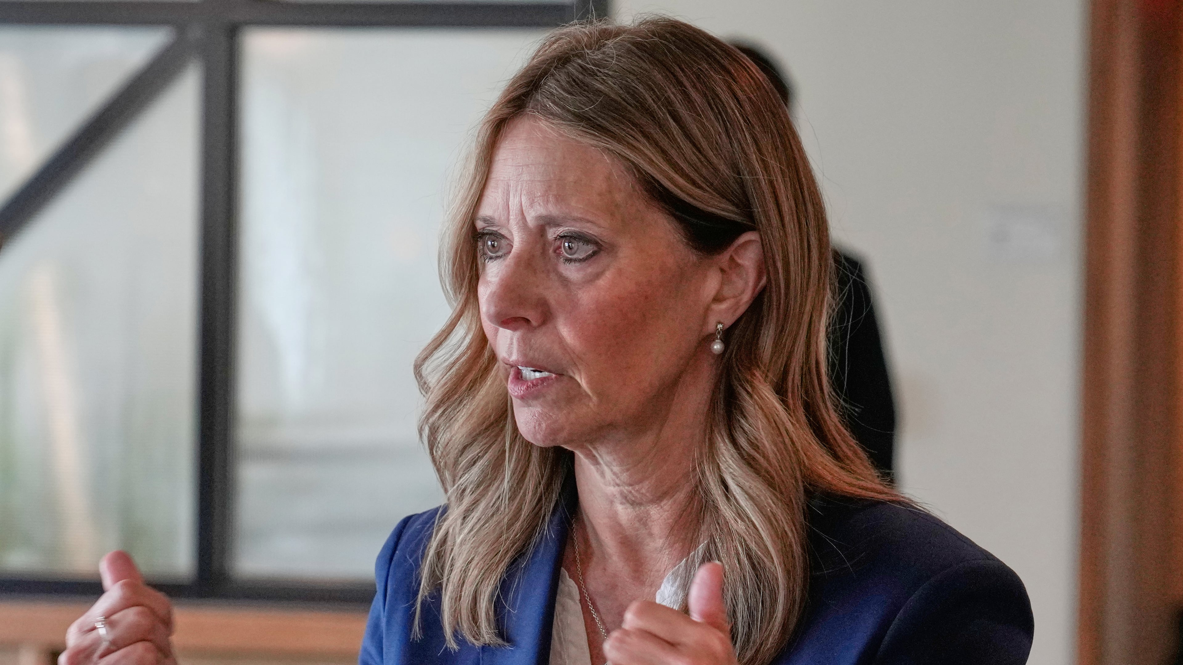 FILE - Amy Acton, Democratic candidate for Governor of Ohio, gestures as she speaks with a reporter in Columbus, Ohio April 15, 2026. (AP Photo/Sue Ogrocki, File)