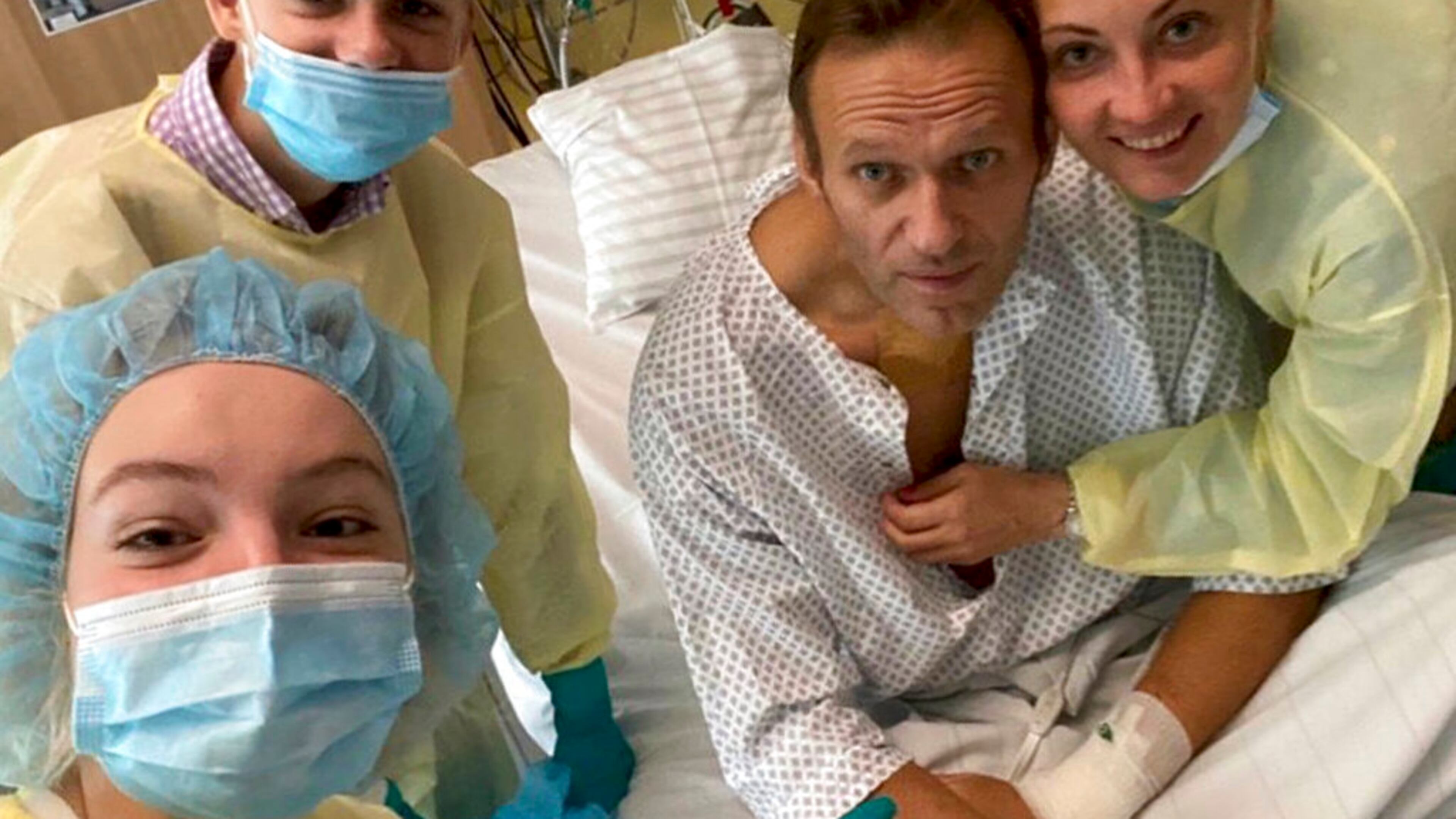 This handout photo published by Russian opposition leader Alexei Navalny on his instagram account, shows himself, centre, and his wife Yulia, right, daughter Daria, and son Zakhar, top left, posing for a photo in a hospital in Berlin, Germany. Russian opposition leader Alexei Navalny has posted the picture of himself in a hospital in Germany and says he's breathing on his own. He posted on Instagram Tuesday Sept. 15, 2020: "Hi, this is Navalny. I have been missing you. I still can't do much, but yesterday I managed to breathe on my own for the entire day." (Navalny instagram via AP)