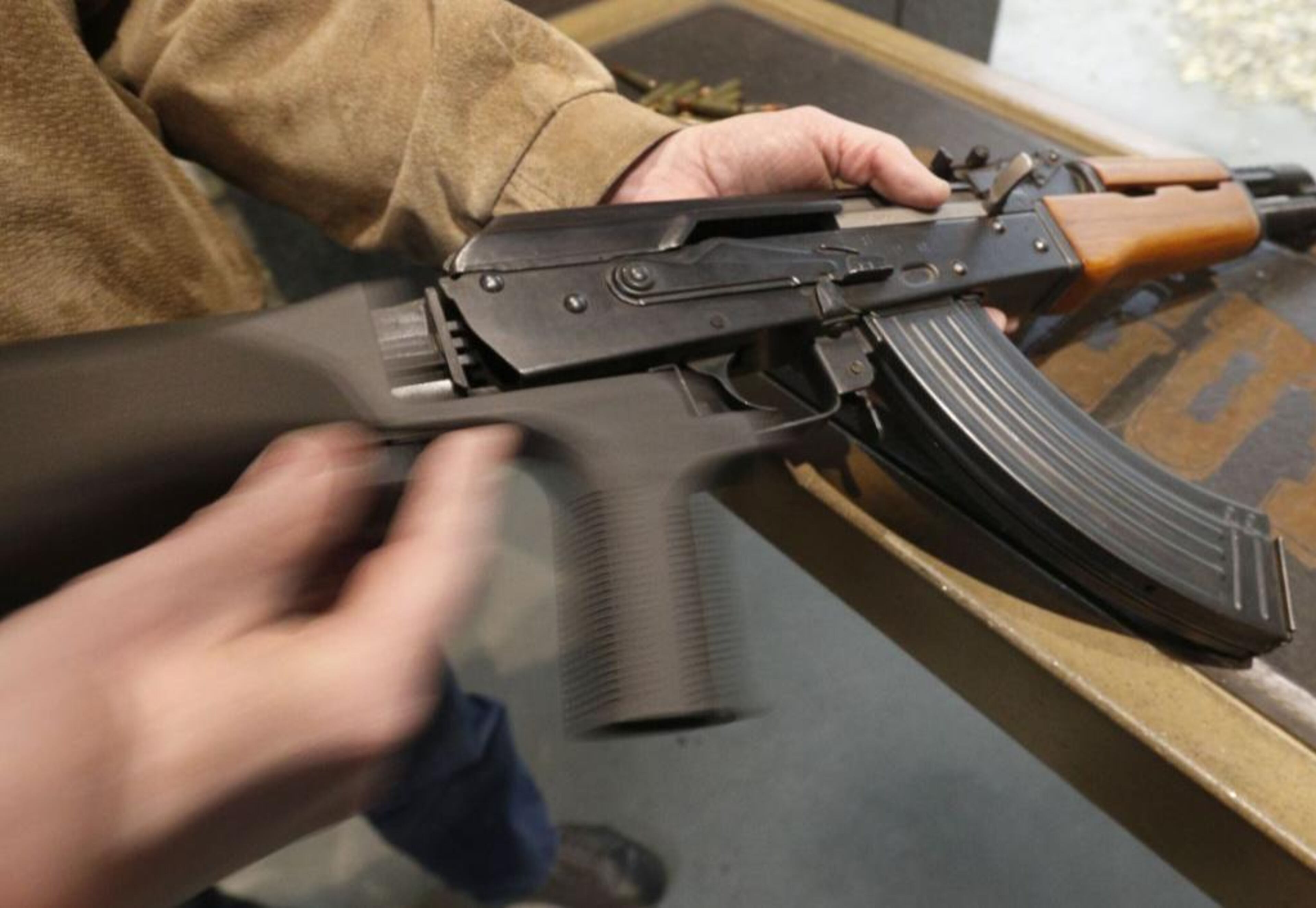 A bump stock is installed on an AK-47 and its movement is demonstrated at Good Guys Gun and Range on February 21, 2018 in Orem, Utah. The bump stock is a device when installed allows a semi-automatic to fire at a rapid rate much like a fully automatic gun.