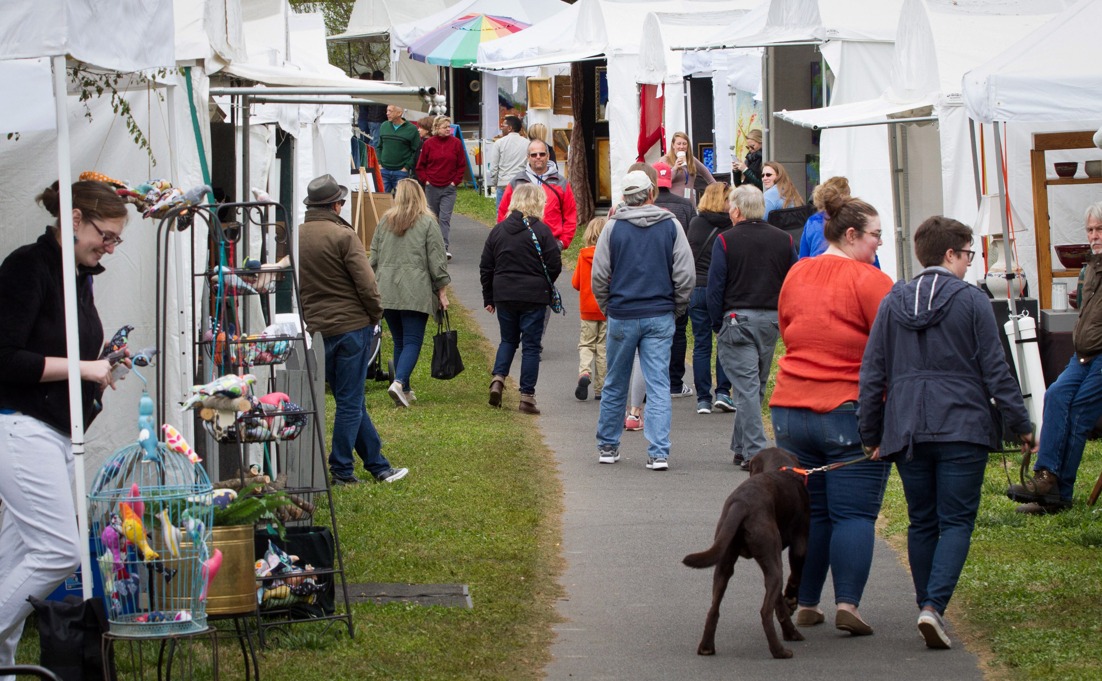 Festivalgoers shop at the many vendor booths during The Festival on Ponce in Atlanta GA Sunday, April 8, 2018. STEVE SCHAEFER / SPECIAL TO THE AJC