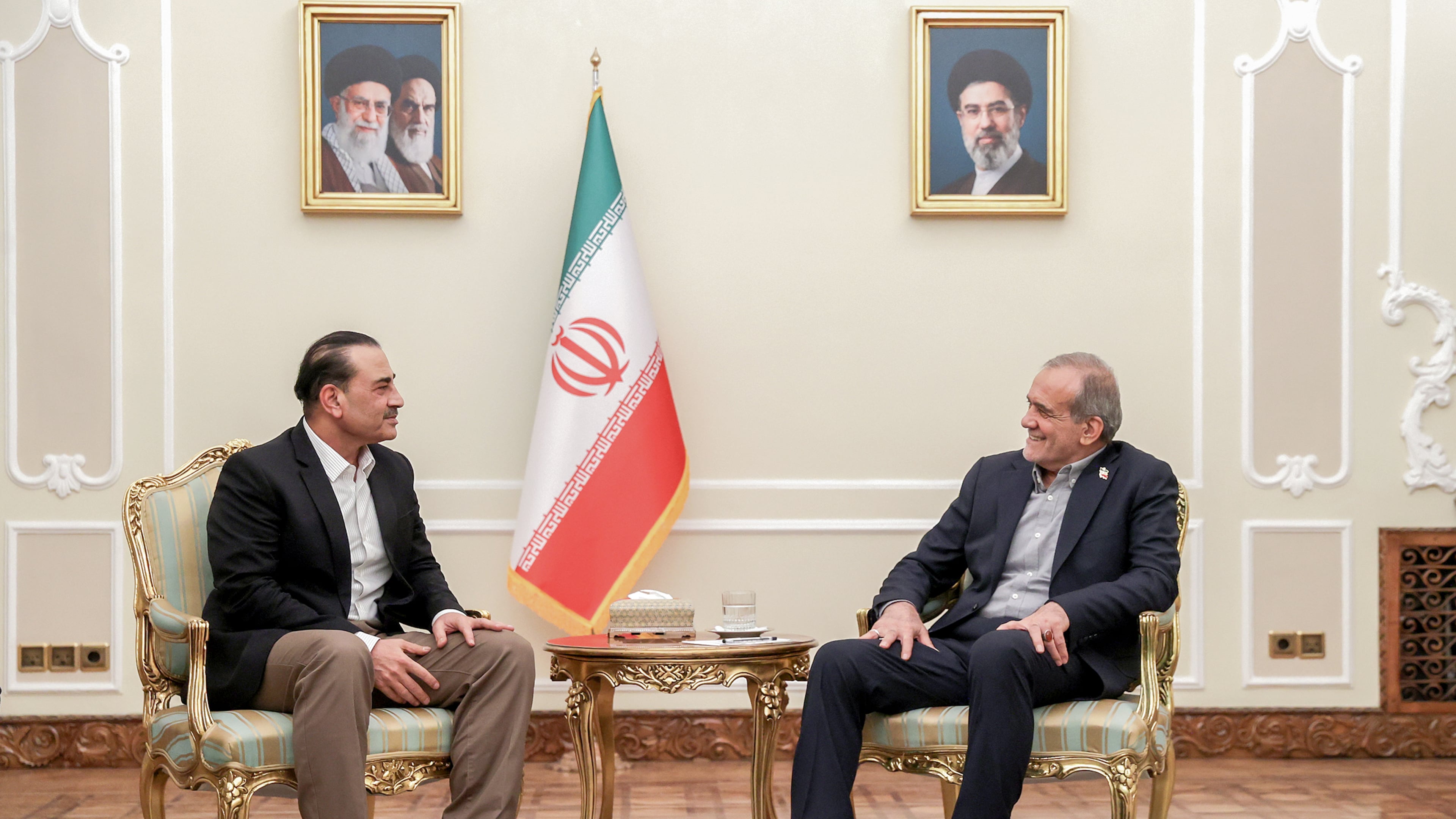 In this photo released by the Iranian Presidency Office, President Masoud Pezeshkian, right, meets Pakistan's Army Chief Field Marshal Gen. Asim Munir in Tehran, Iran, Monday, Aug. 24, 2026. (Iranian Presidency Office via AP)