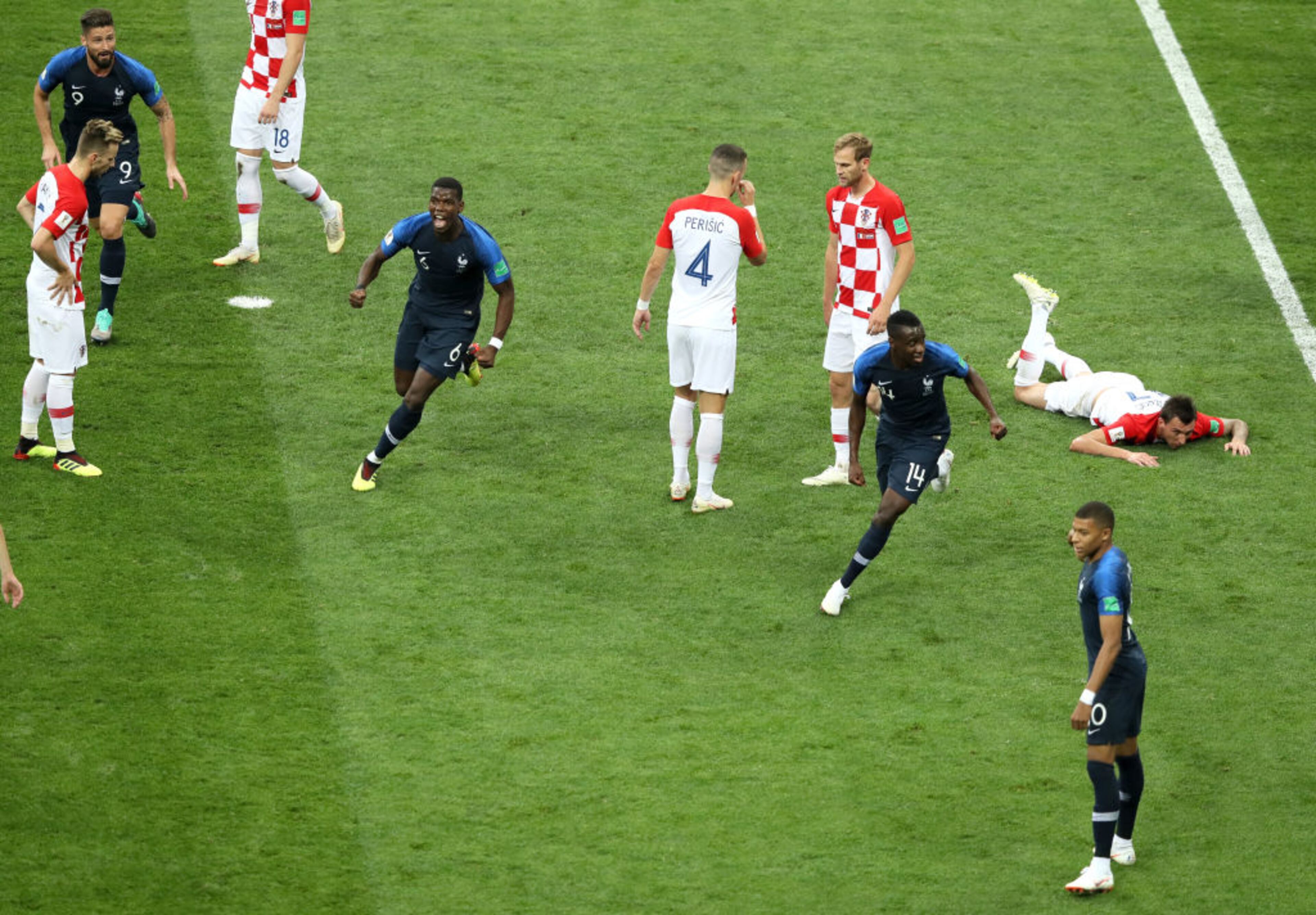 MOSCOW, RUSSIA - JULY 15: Paul Pogba and Blaise Matuidi of France celebrate after Mario Mandzukic of Croatia scores an own goal for France's first goal during the 2018 FIFA World Cup Final between France and Croatia at Luzhniki Stadium on July 15, 2018 in Moscow, Russia. (Photo by Kevin C. Cox/Getty Images)