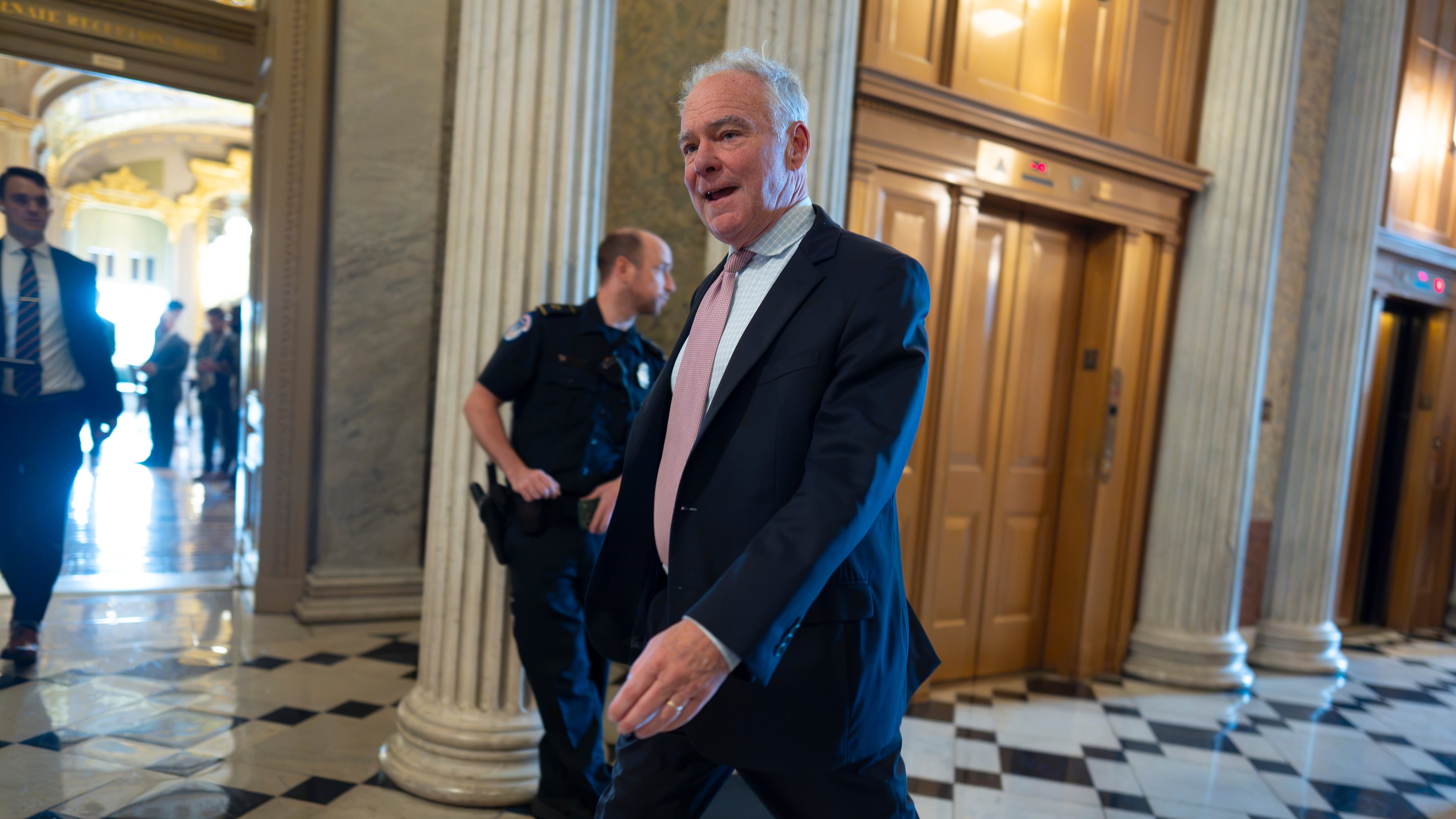 Sen. Tim Kaine, D-Va., arrives at the chamber ahead of a vote on a war powers resolution, at the Capitol in Washington, Thursday, Sept. 24, 2026. (AP Photo/J. Scott Applewhite)