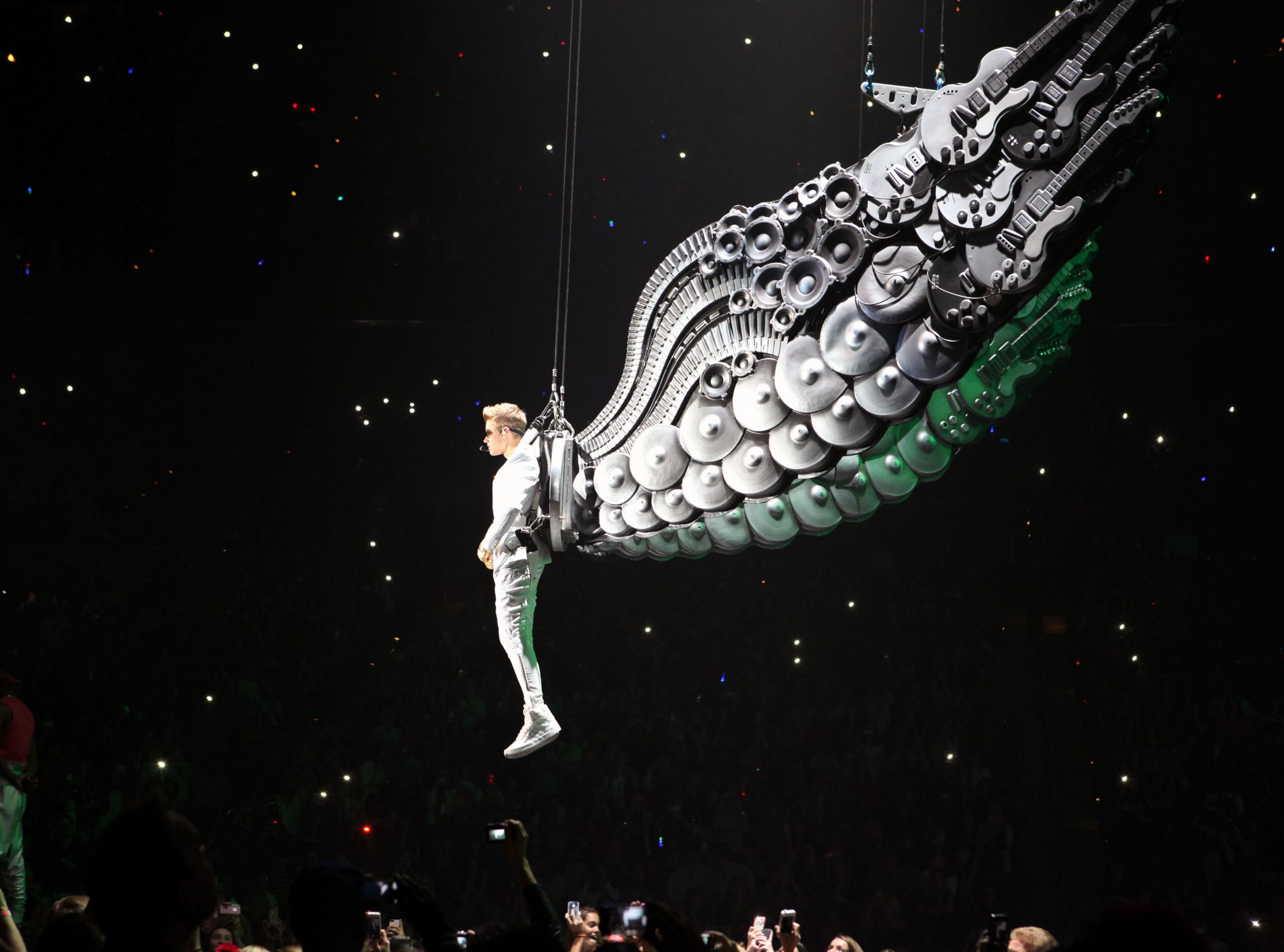 Justin Bieber makes a dramatic entrance at Philips Arena in Atlanta Wednesday, Jan. 23, 2013.