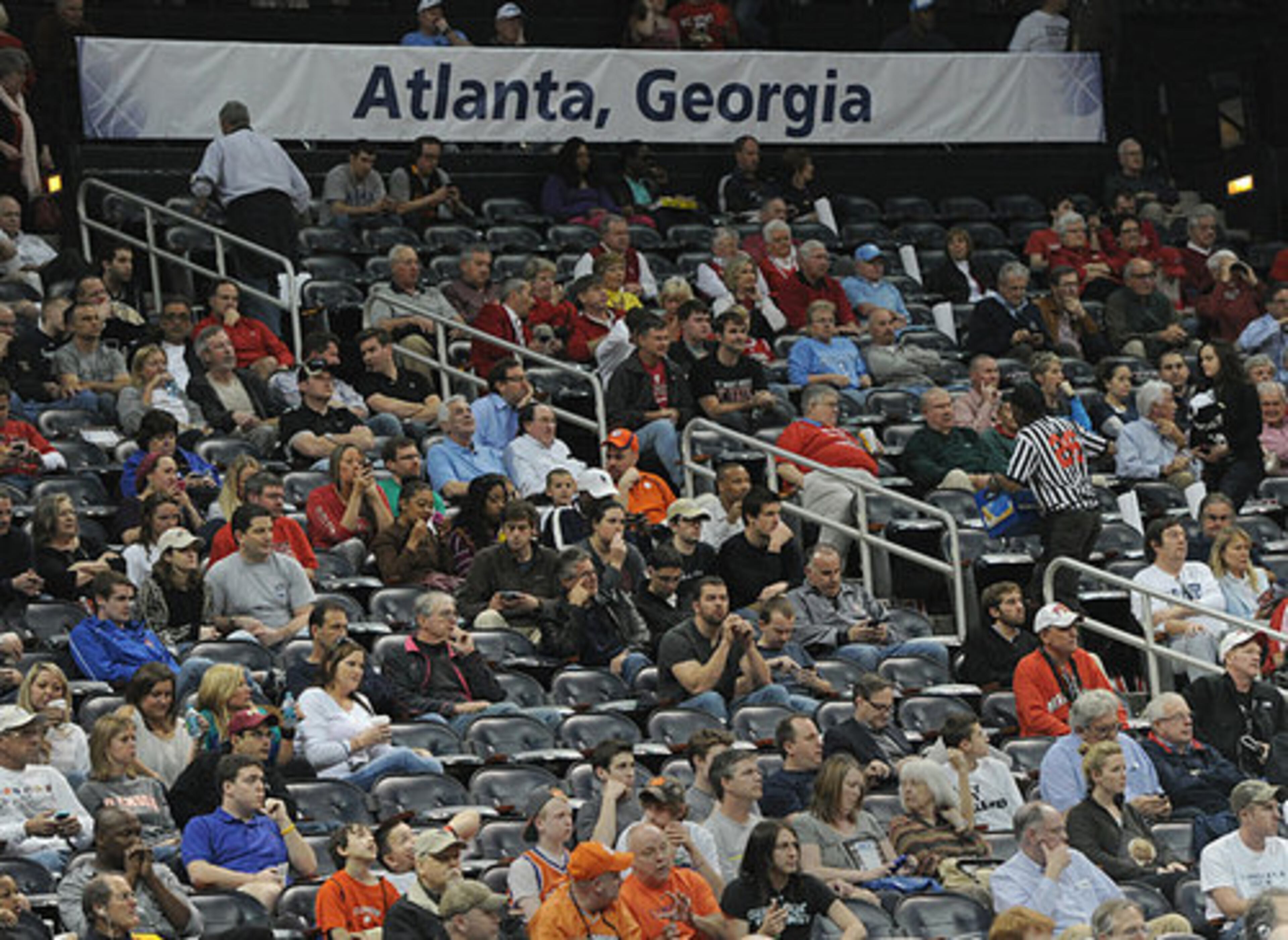 A large number of empty seats remain after the first game of the 59th Annual ACC Tournament in Philips Arena in Atlanta on Thursday, March 8, 2012.