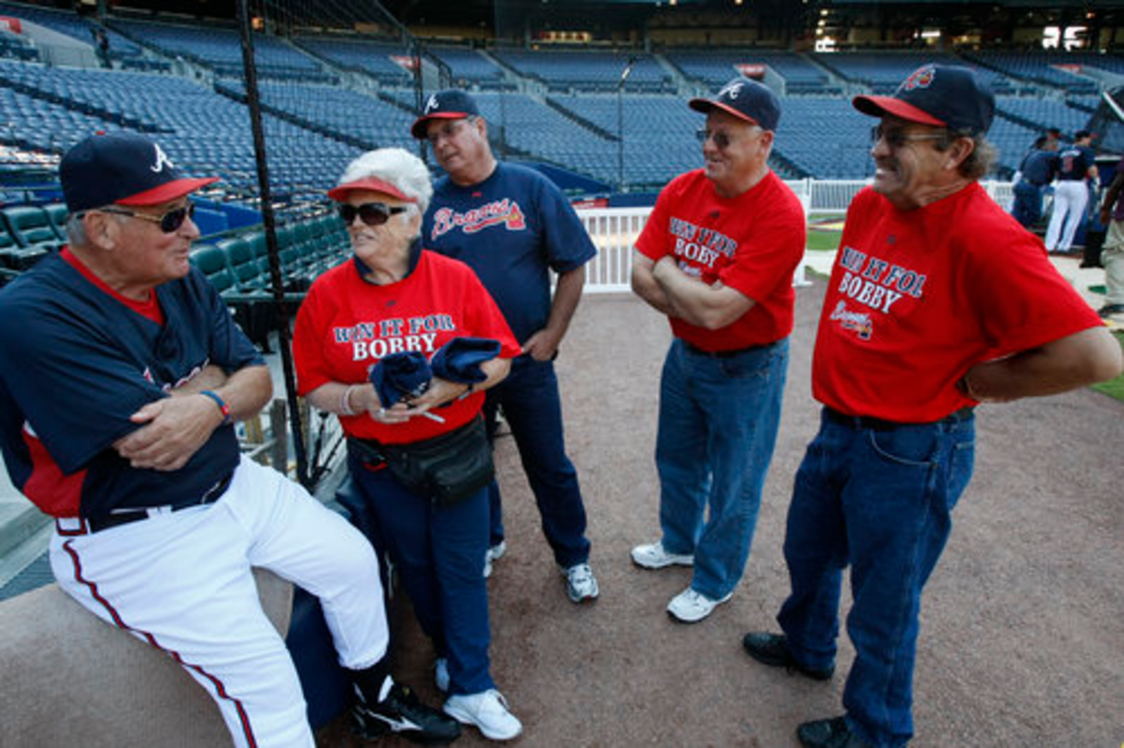 Bobby Cox spends some time with his cousins before taking on the Phillies at Turner Field in Atlanta on Friday, Oct. 1, 2010. From left to right are Sandra Cox-Ott, her husband James Ott, Mel Cox, and Stan Cox, all from Selma, CA, where Cox grew up. The cousins are all wearing Win It For Bobby shirts.