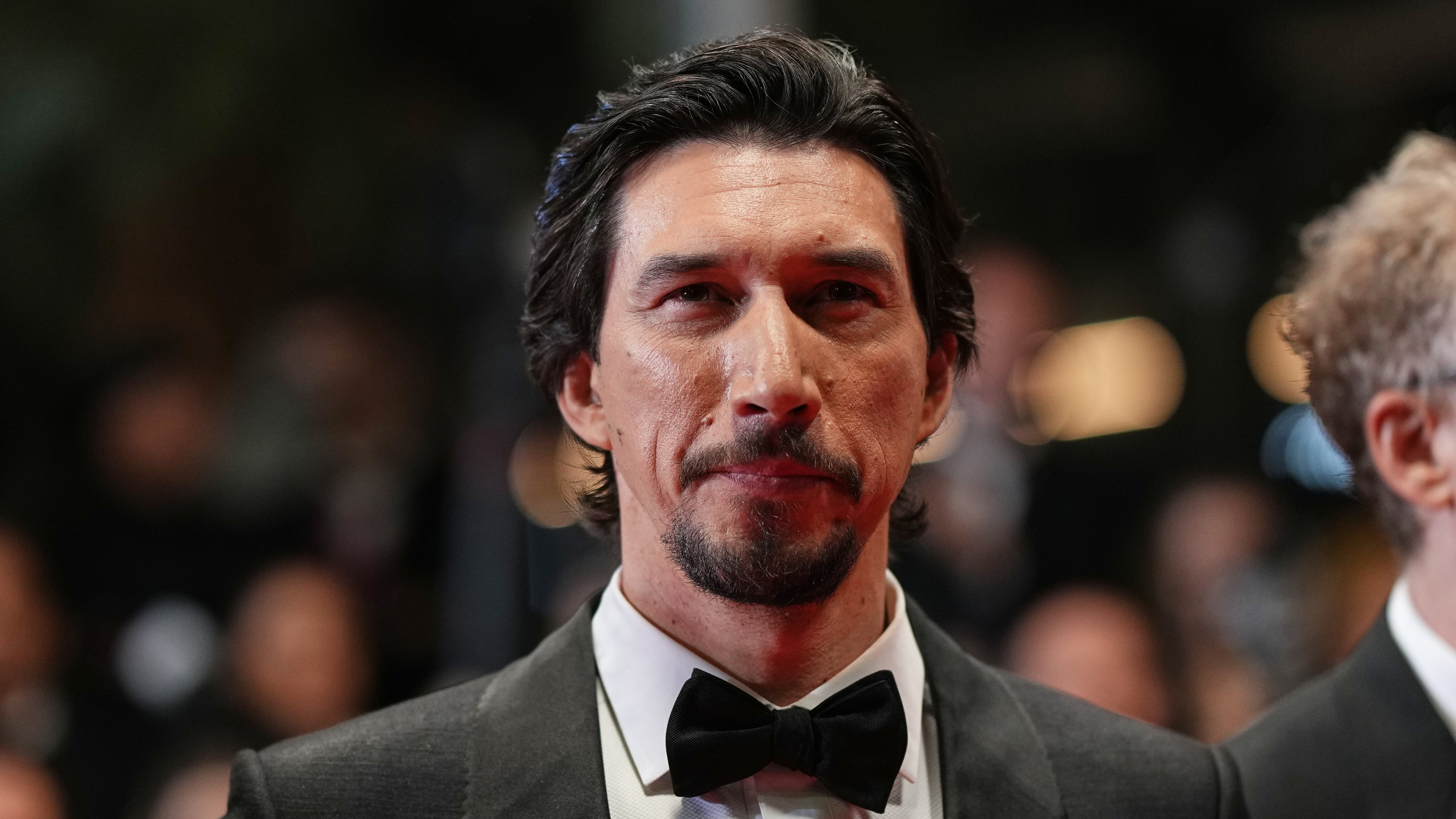FILE - Adam Driver poses for photographers upon arrival at the premiere of the film 'Paper Tiger' at the 79th international film festival, Cannes, southern France, Saturday, May 16, 2026. (Photo by Scott A Garfitt/Invision/AP, File)