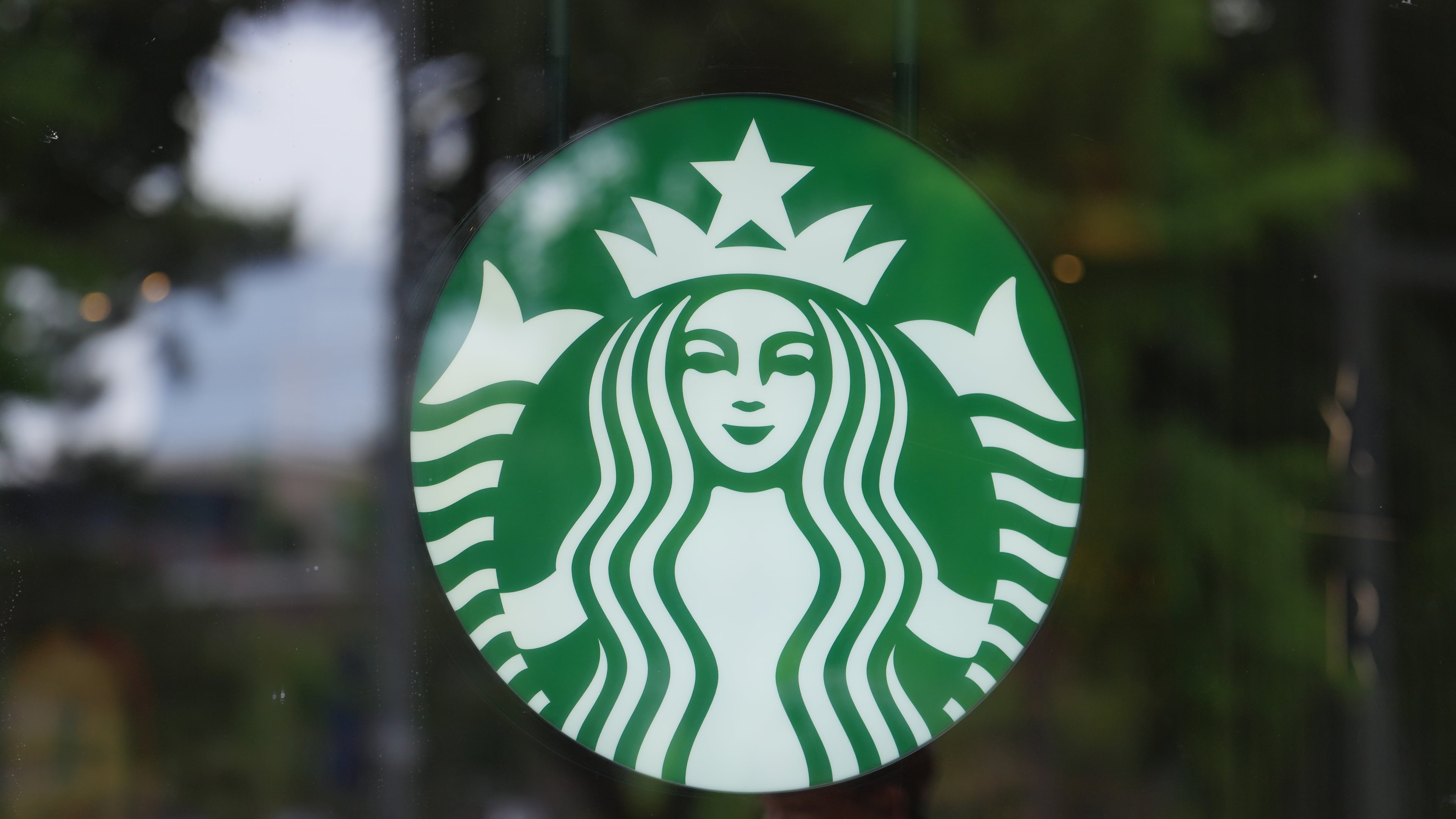A sign for Starbucks is displayed in Seoul, South Korea, Tuesday, May 26, 2026. (AP Photo/Lee Jin-man)