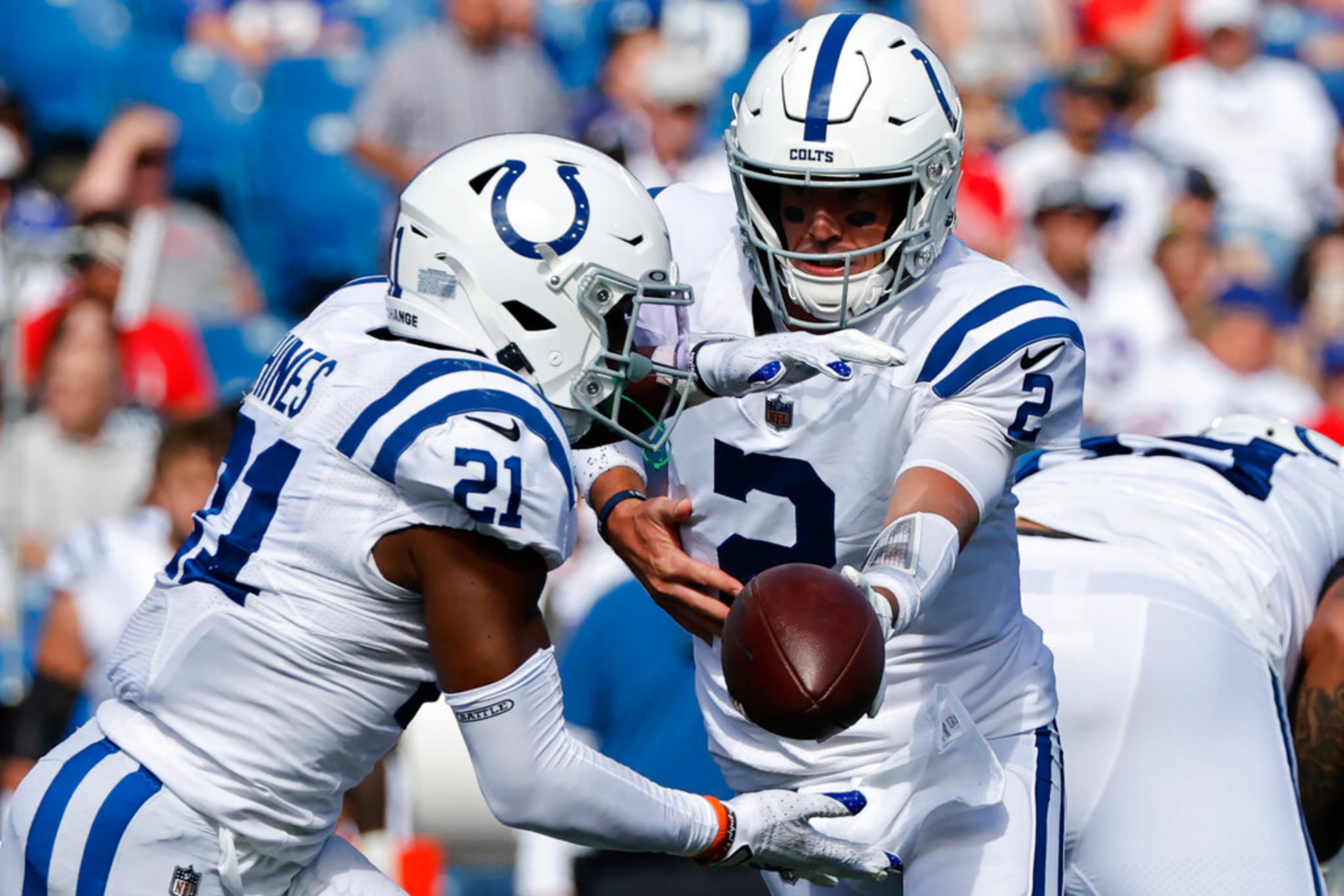 Indianapolis Colts quarterback Matt Ryan (2) hands off to running back Nyheim Hines (21) during the first half of a preseason NFL football game against the Buffalo Bills, Saturday, Aug. 13, 2022, in Orchard Park, N.Y. (AP Photo/Jeffrey T. Barnes)
