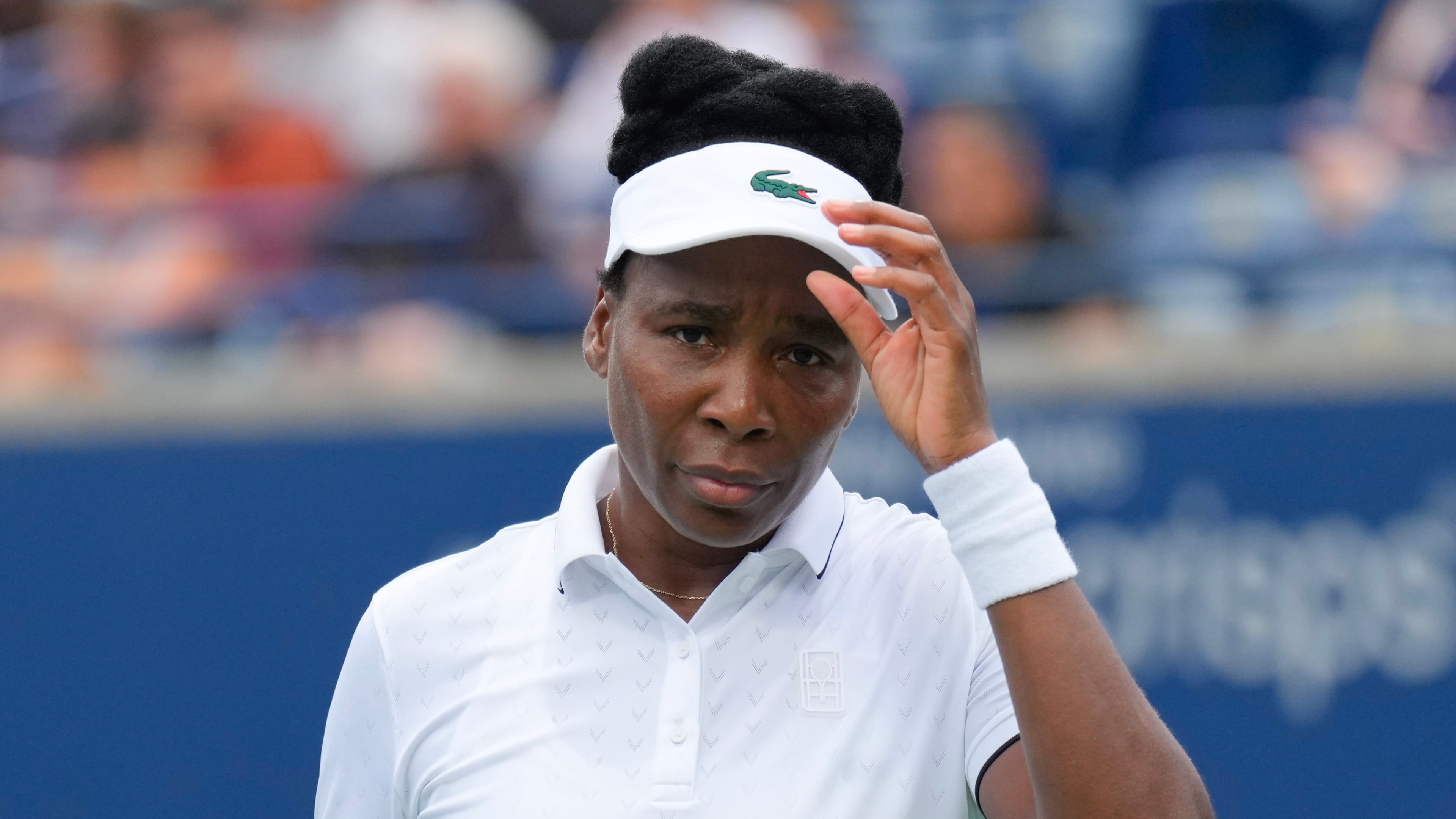 Venus Williams reacts during her straight sets defeat by Kamilla Rakhimova during the National Bank Open tennis tournament in Toronto, Sunday, Aug. 2, 2026. (Chris Young/The Canadian Press via AP)