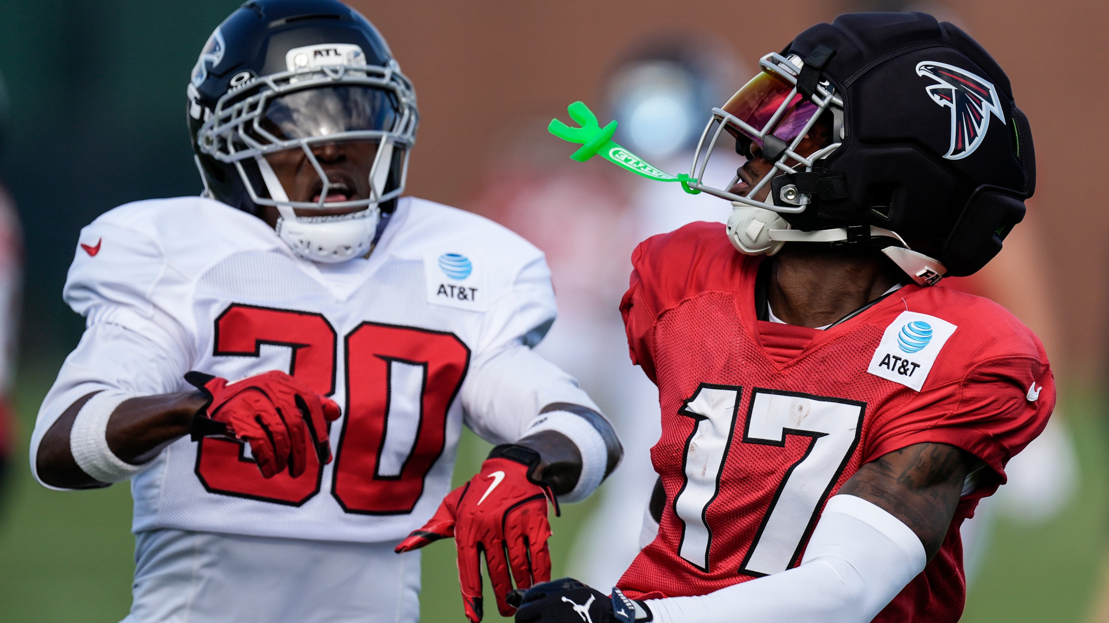 The Falcons' Zachariah Branch (17) works for a catch against Darnay Holmes during training camp Monday, Aug. 3, 2026, in Flowery Branch. (Mike Stewart/AP)