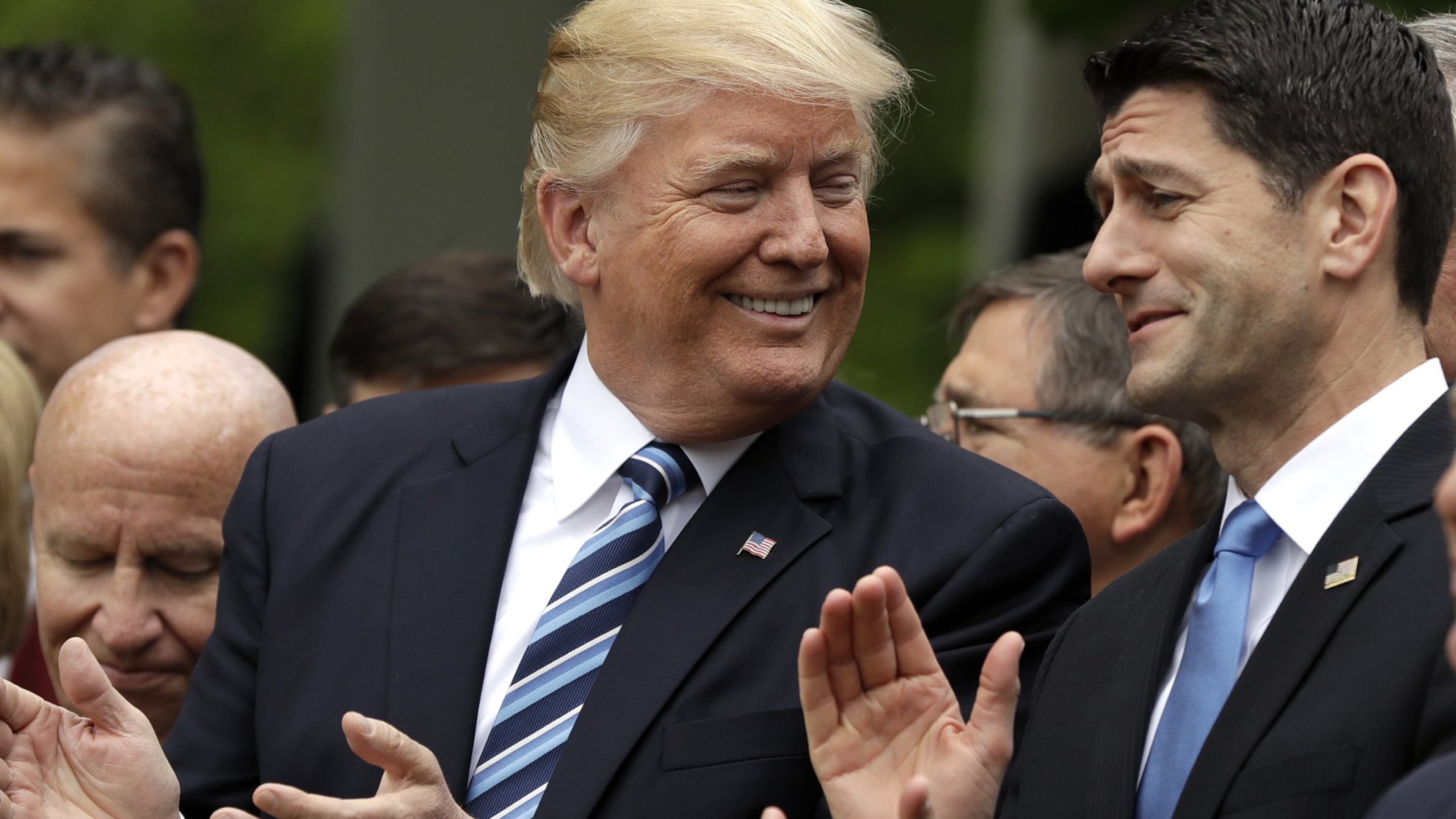 In this May 4, 2017, photo, President Donald Trump talks to House Speaker Paul Ryan of Wis. in the Rose Garden of the White House in Washington, after the House pushed through a health care bill. (AP Photo/Evan Vucci)