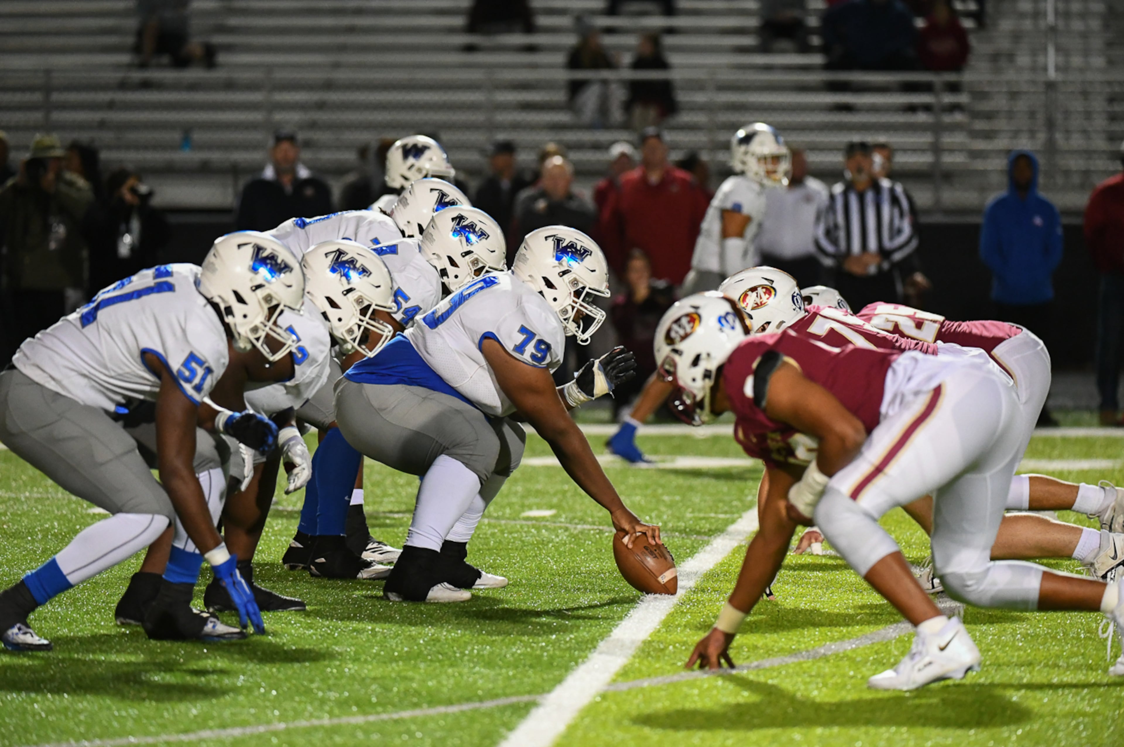 Westlake and Mill Creek players take their positions on the line of scrimmage Friday, Nov. 25, 2022, at Mill Creek High School in Hoschton. Westlake has produced five first-round NFL draft picks, the most of any Georgia school. (Jamie Spaar for the AJC)