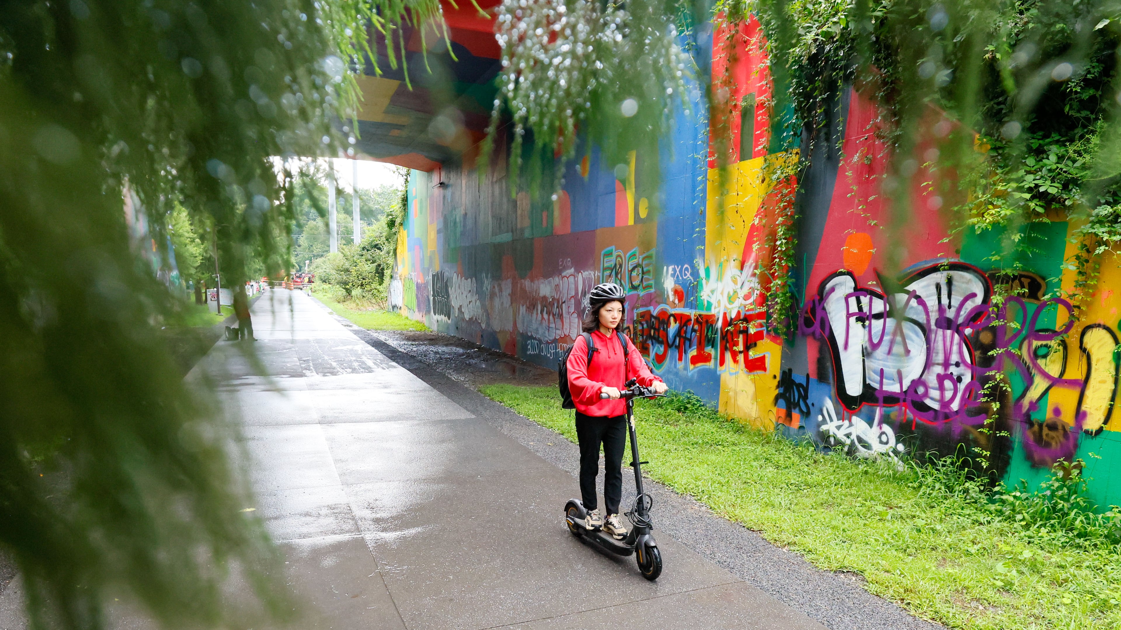 Mona Su, who lives in Midtown, was seen riding her scooter along the beltline on her way home on Monday, July 22, 2024. For Mona Su, riding scooters and MARTA is a car-free lifestyle that provides an easy and reliable commuting alternative.
(Miguel Martinez / AJC)