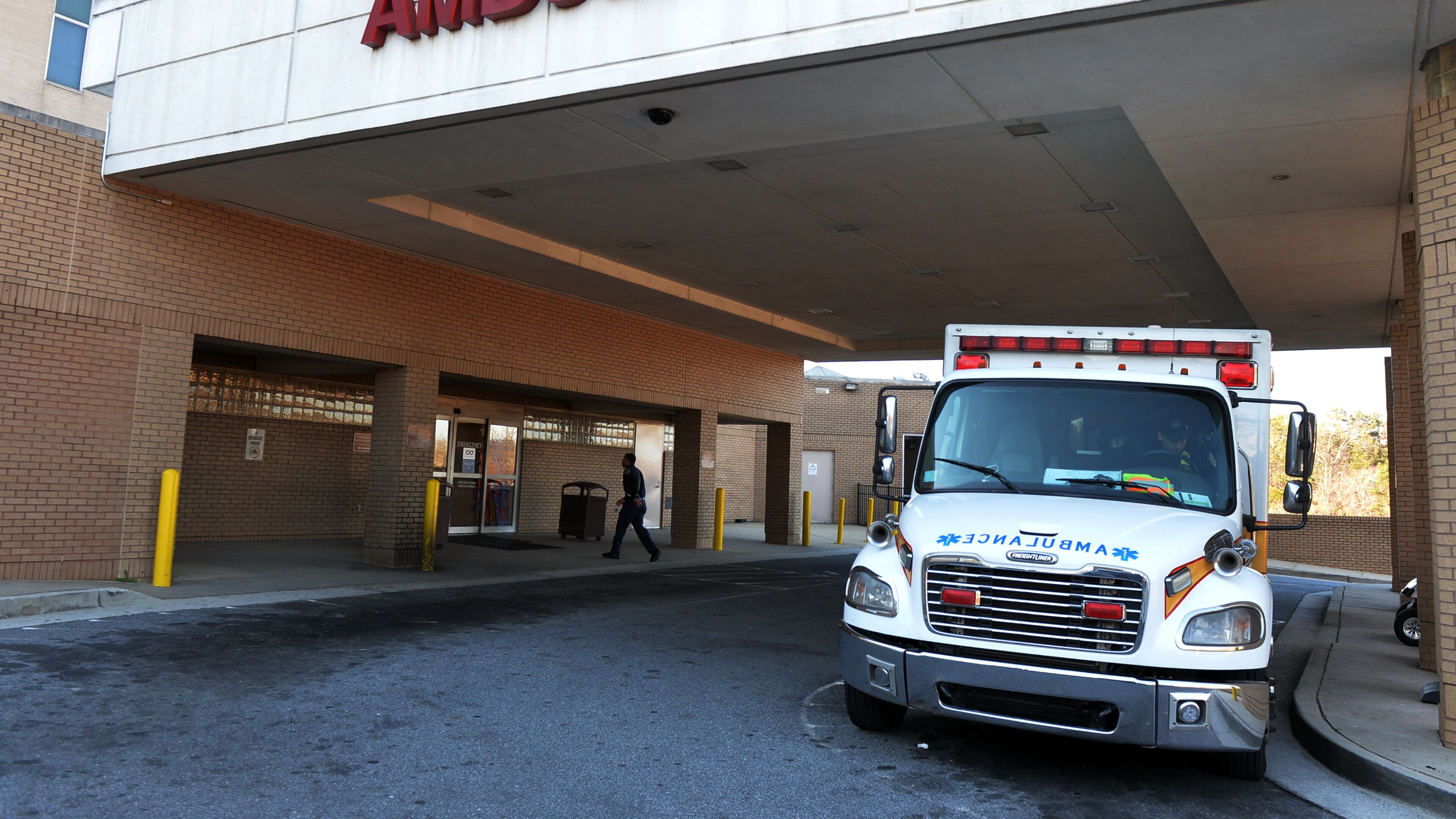Clayton County ambulances line up in the driveway outside the emergency room of the Southern Regional Medical Center in Riverdale. KENT D. JOHNSON/ KDJOHNSON@AJC.COM