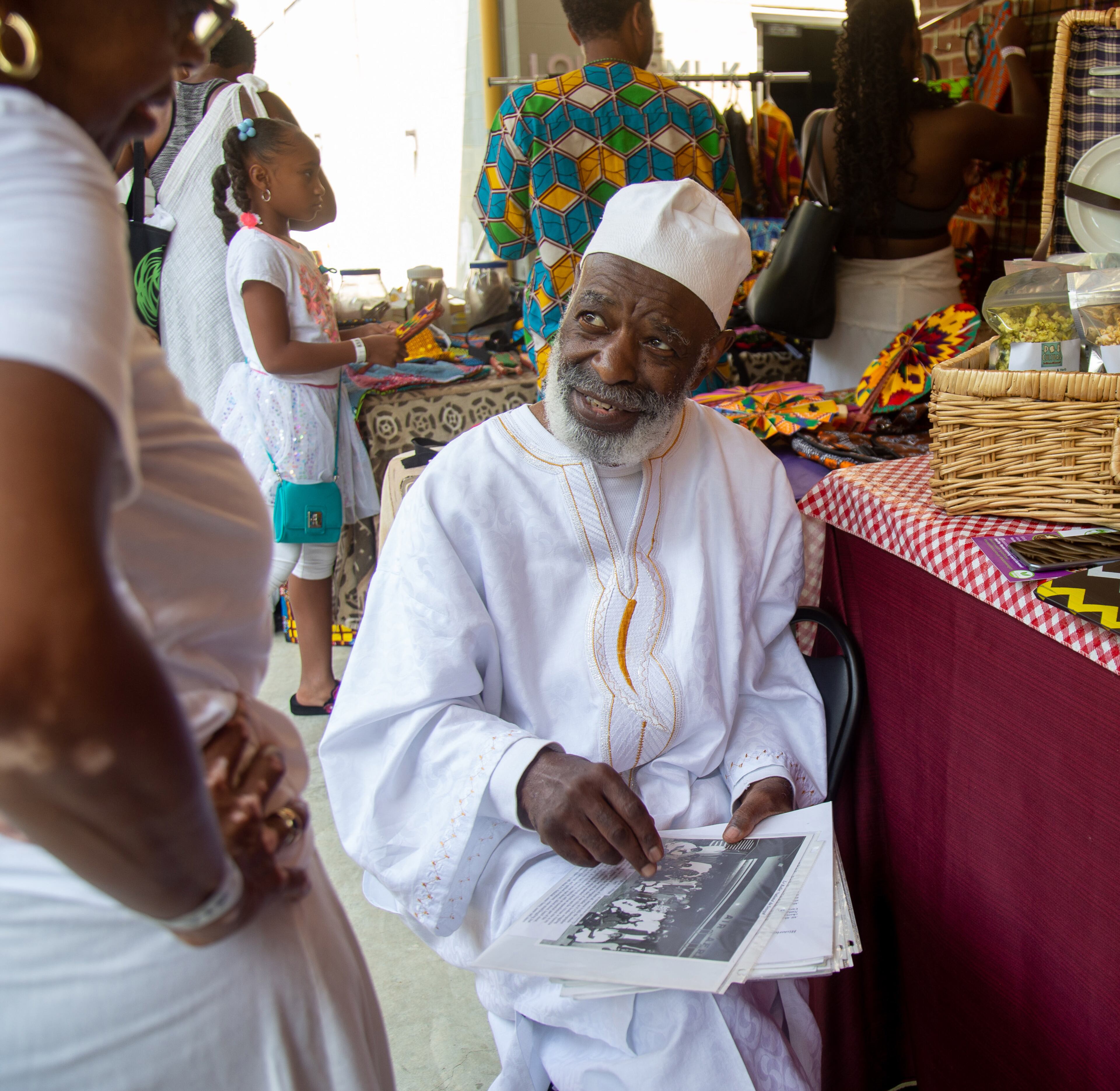 Former choreographer for the Senegalese National Ballet, Ali Abdullah talks to festival attendees during the 11th Atlanta African Dance & Drum Festival at the Covenant House of Georgia on Sunday, July 28, 2019. STEVE SCHAEFER / SPECIAL TO THE AJC
