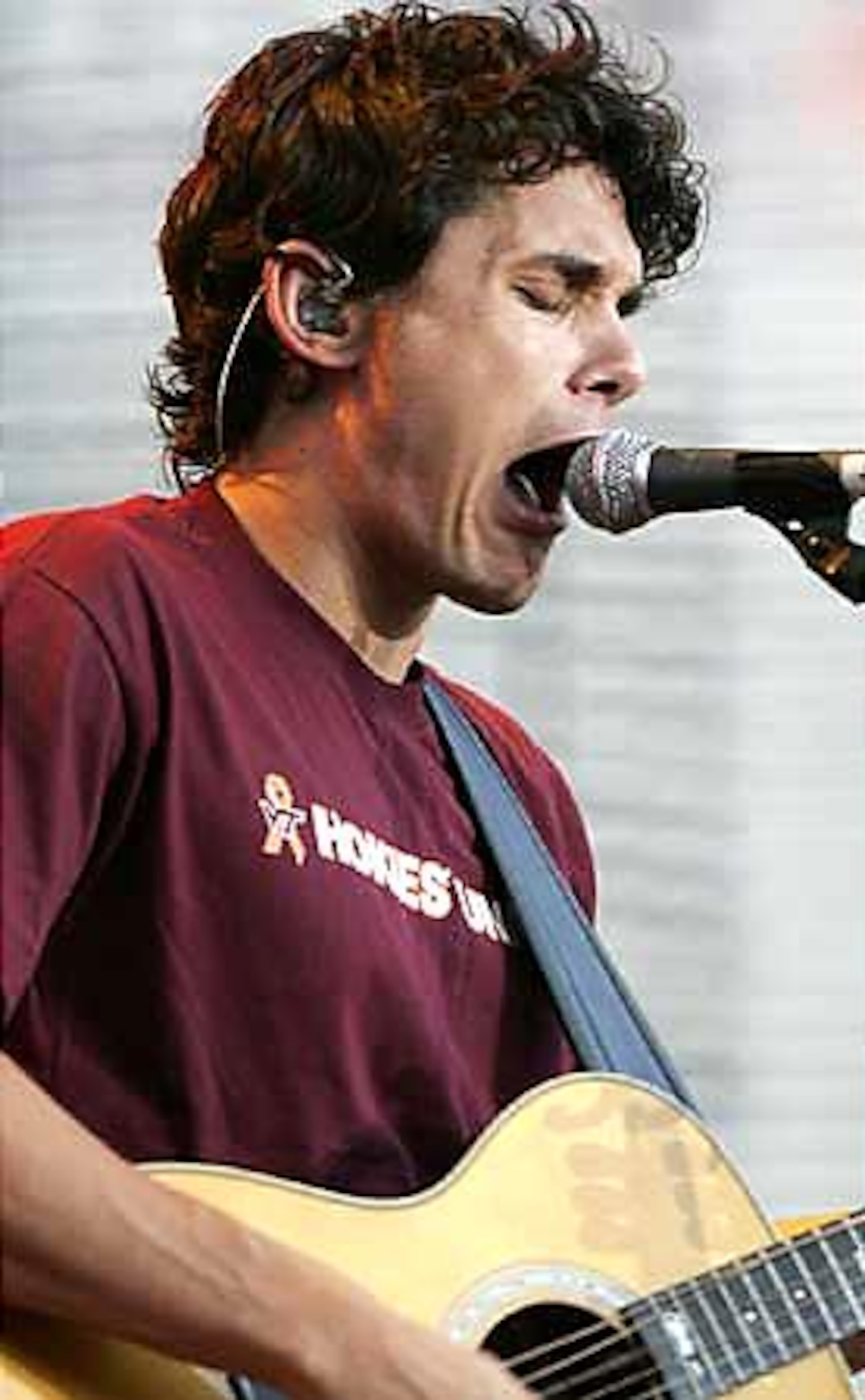 Grammy Award-winning singer John Mayer performs at the Virginia Tech concert put together by Dave Matthews.