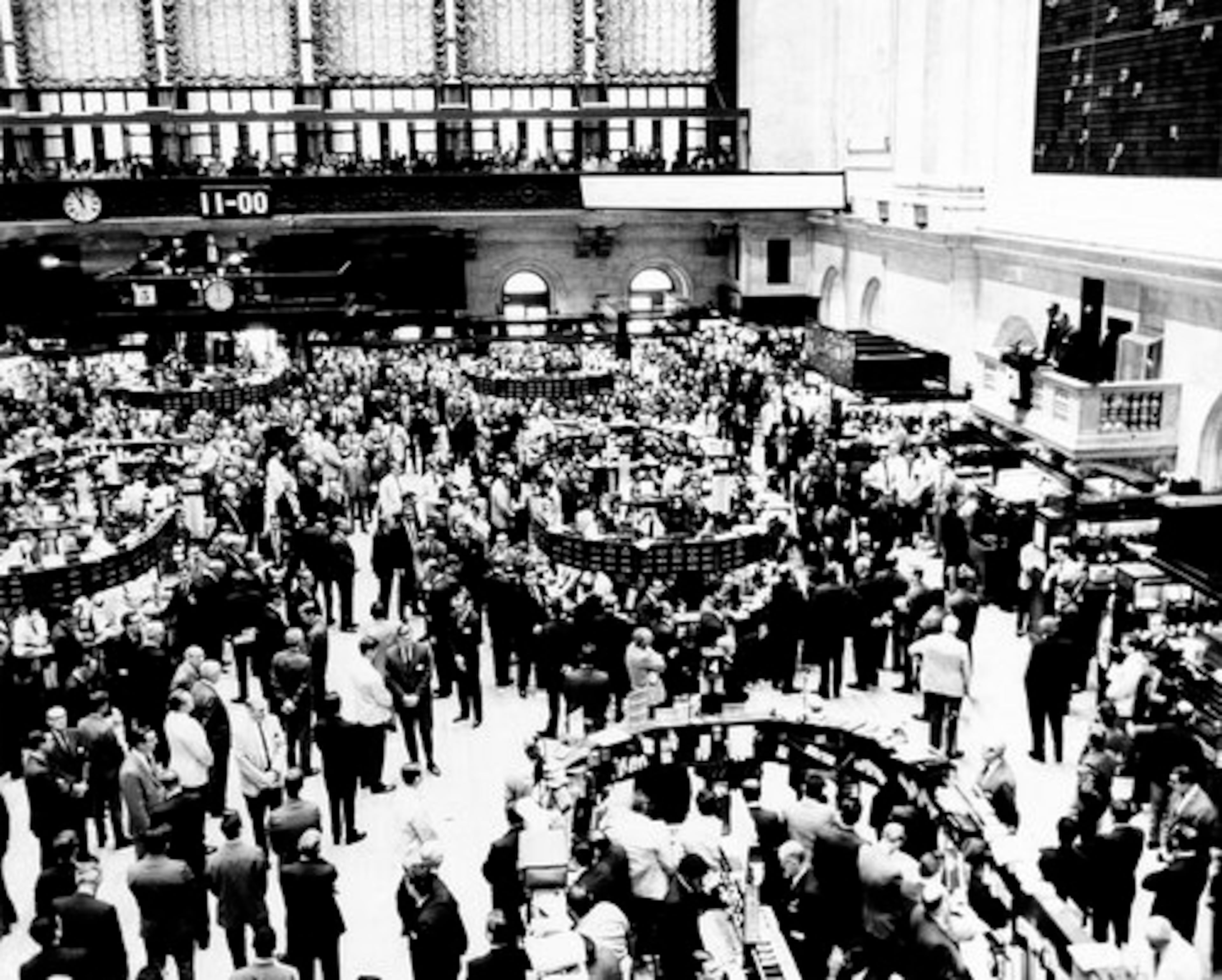 Activity on the floor of the New York Stock Exchange is halted at 11 o'clock in a minute of tribute to assassinated civil rights leader Dr. Martin Luther King, Jr., April 5, 1968. Both the New York and American exchanges stopped trading for a moment of silence.