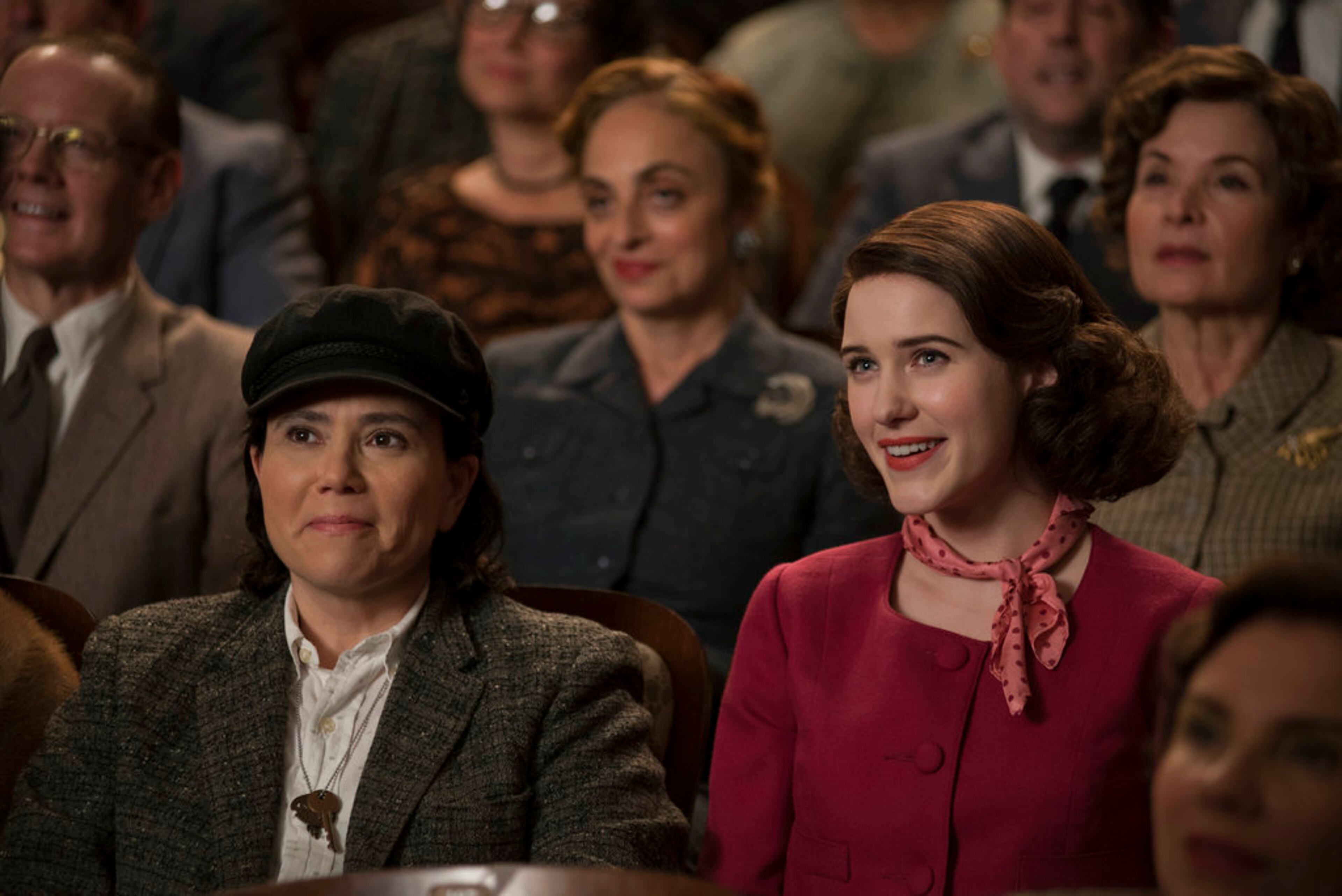 This image released by Amazon shows Alex Borstein, left, and Rachel Brosnahan in "The Marvelous Mrs. Maisel." The program was nominated for an Emmy on Thursday for outstanding comedy series. The 70th Emmy Awards will be held on Monday, Sept. 17. (Nicole Rivelli/Amazon via AP)