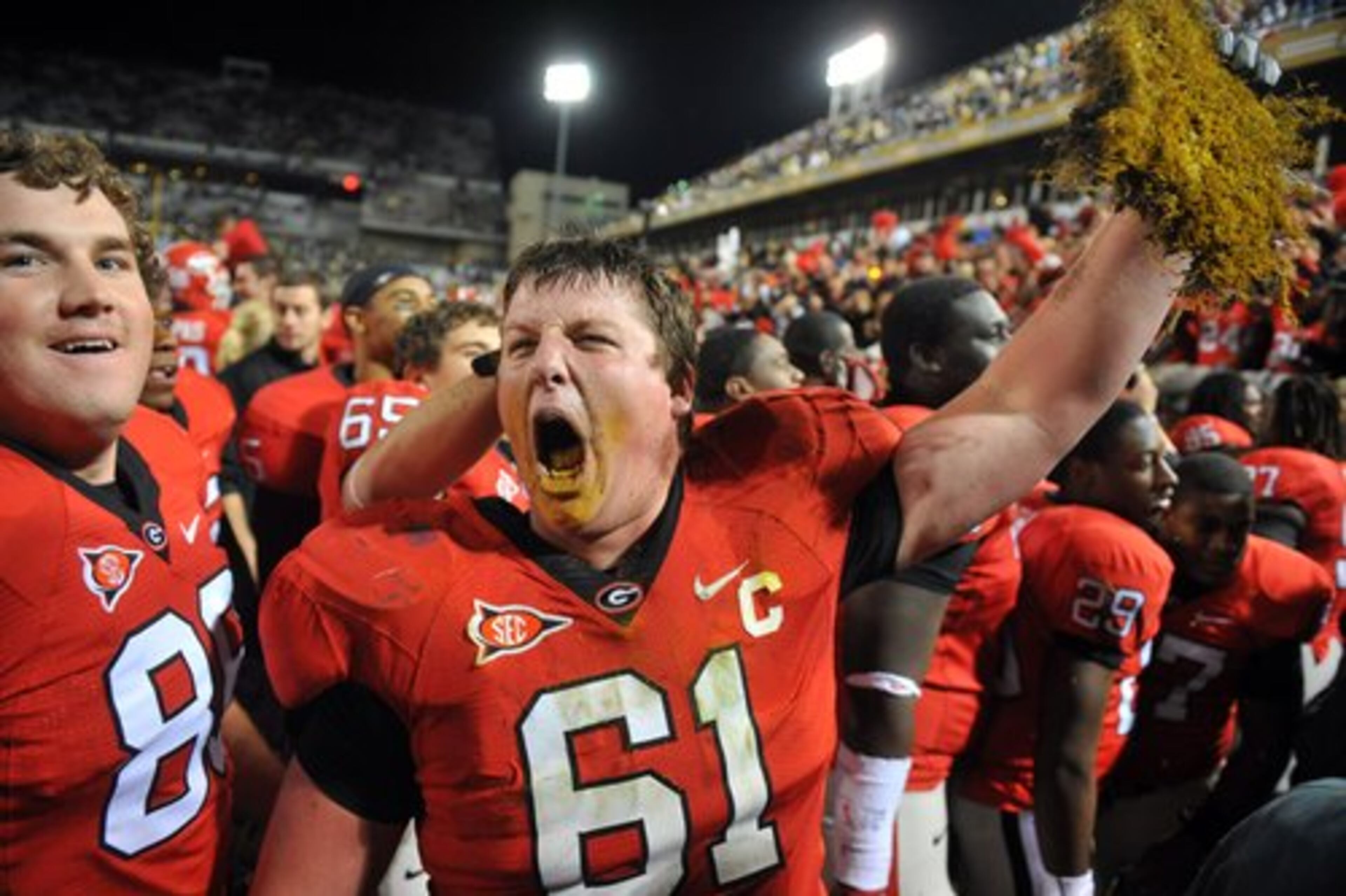 GEORGIA 30, (7) GEORGIA TECH 24 -- The Bulldogs took a page from the Jackets' playbook and ran for 339 yards -- most in a game in the Mark Richt era -- to reclaim state bragging rights. Freshman Washaun Ealey rambled for 183 yards and Caleb King broke loose for 166 yards and two touchdowns. Georgia, which took some souvenir turf, ends its regular season 7-5, 4-4 in SEC and 1-3 against Top 25 teams.