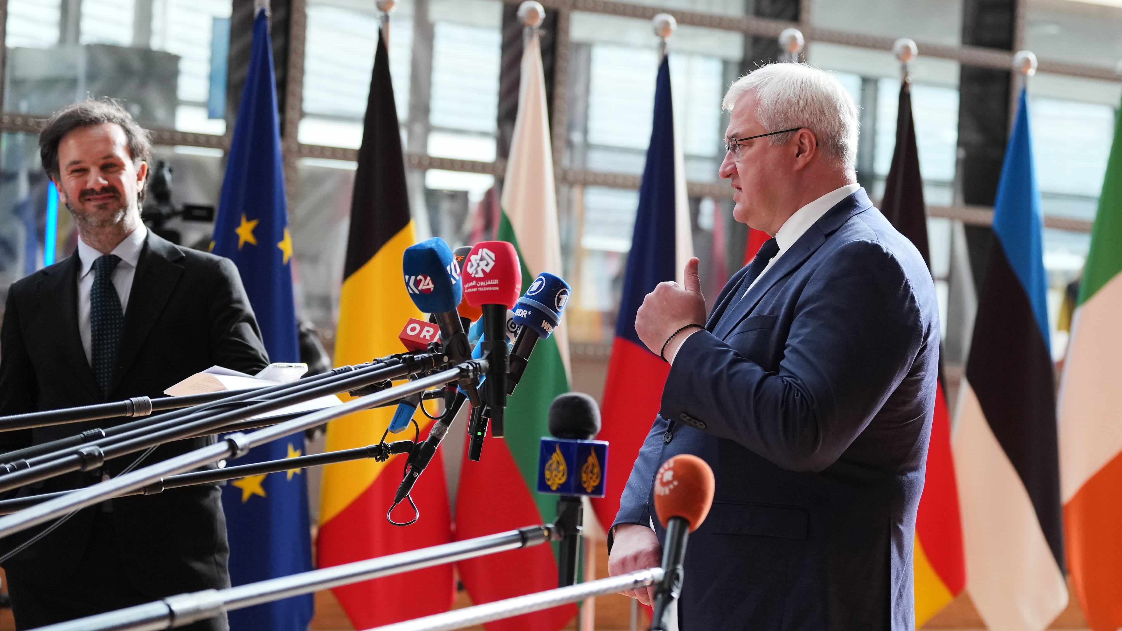 Ukraine's Foreign Minister Andrii Sybiha, right, speaks with the media as he arrives for a meeting of EU foreign ministers at the European Council building in Brussels, Monday, May 11, 2026. (AP Photo/Virginia Mayo)