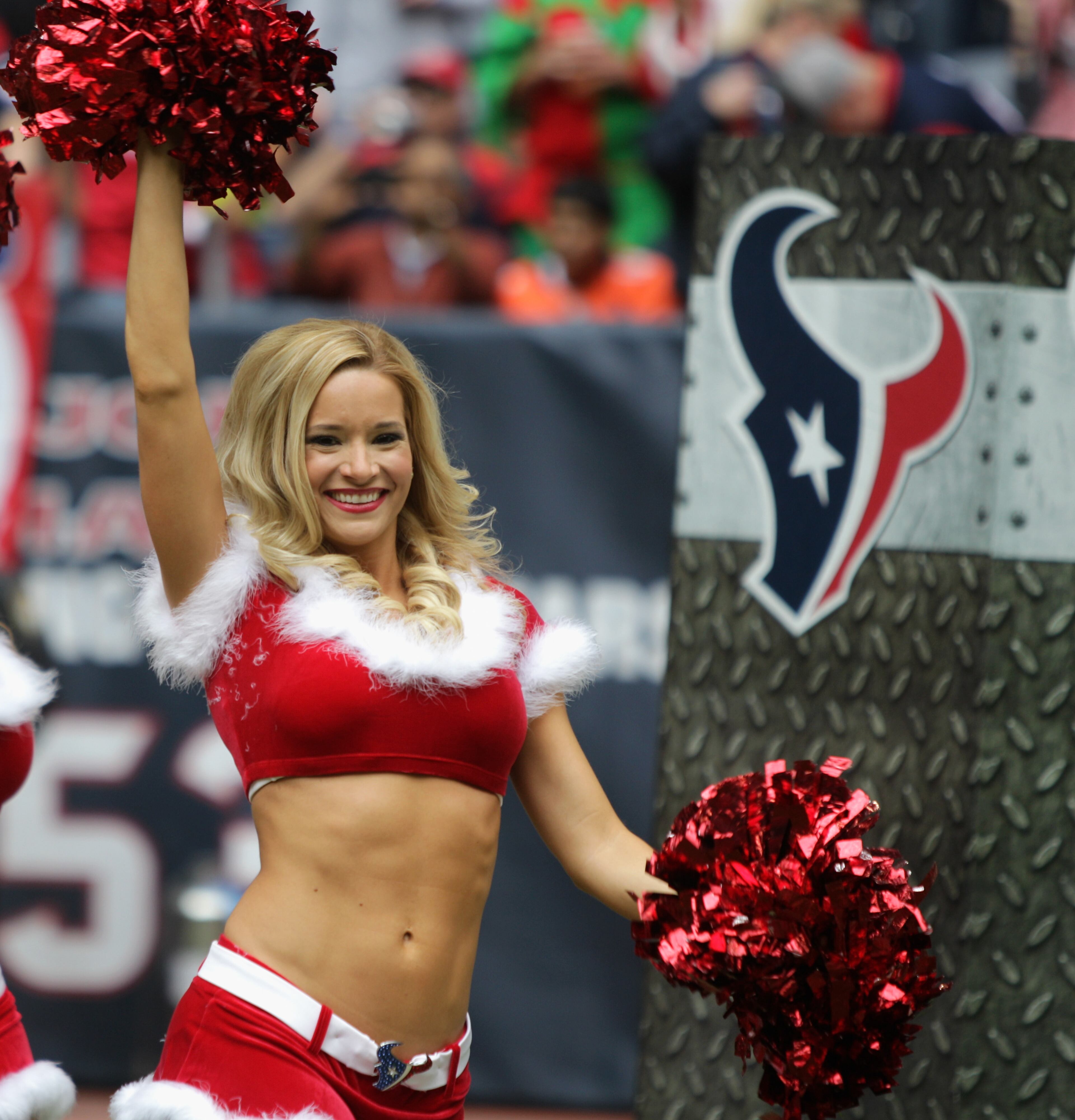 Houston Texans Cheerleaders perform before the Denver Broncos played the Houston Texans at Reliant Stadium on Dec. 22, 2013 in Houston. (Photo by Bob Levey/Getty Images)