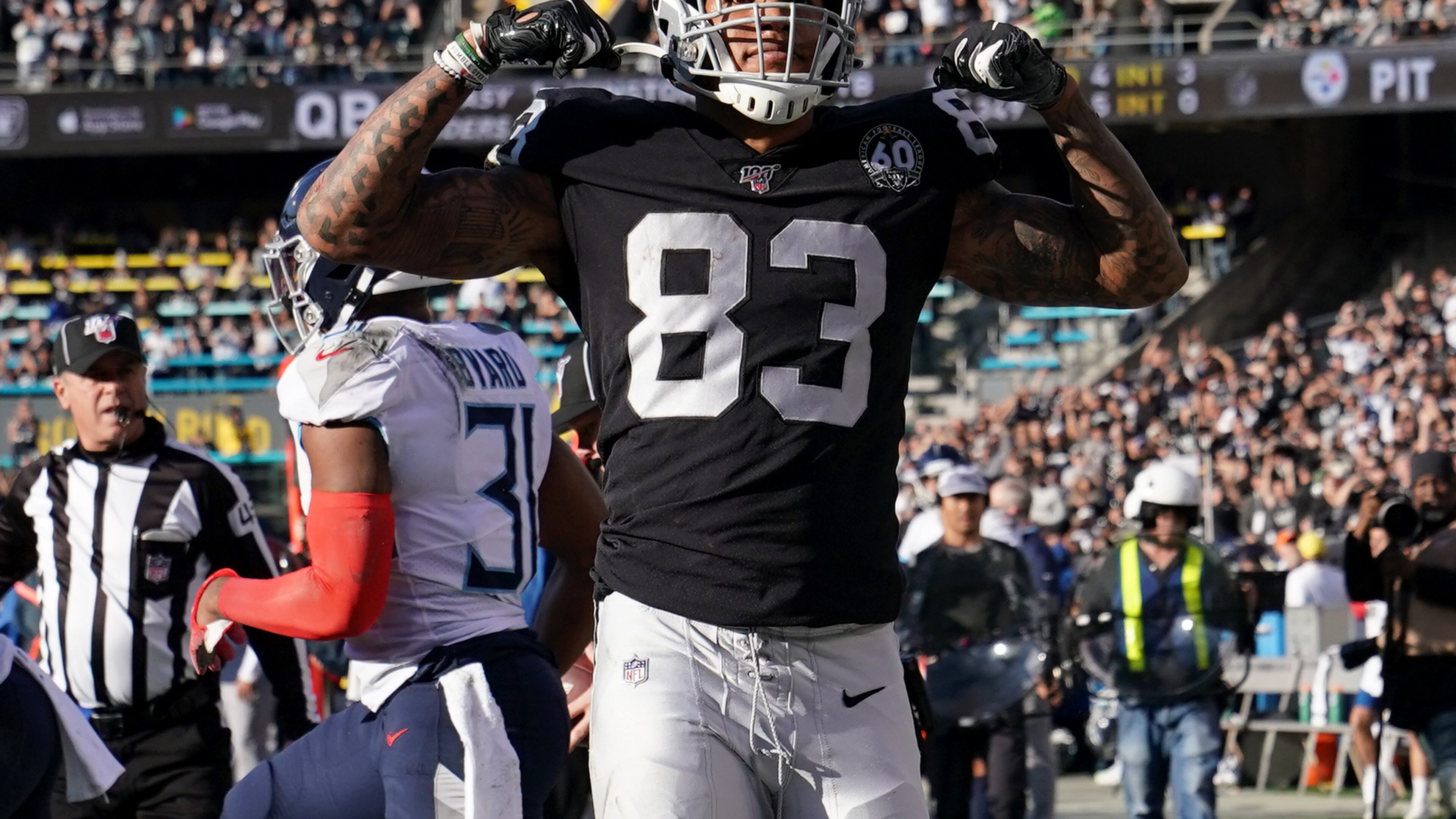 Look at me now: The Raiders Darren Waller flexes after a reception against Tennessee Sunday. (Photo by Thearon W. Henderson/Getty Images)
