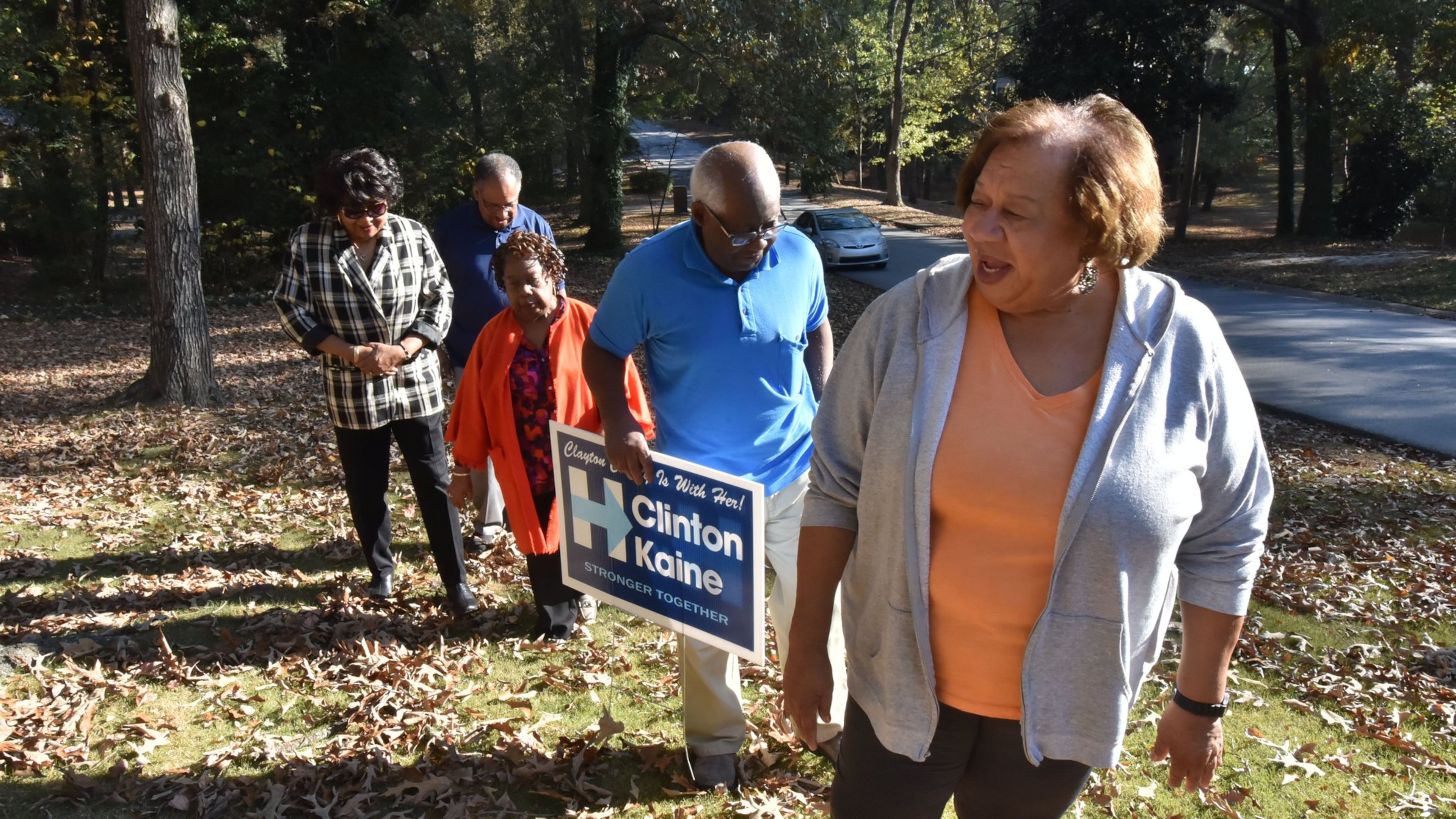 Hillary Clinton supporters (from left) Bertha Tivey, her husband Ronald Tivey, Vivian Baldwin, her husband Ivan Baldwin, and Emma Godbee, walk back to Baldwin’s home in Riverdale on Thursday, November 10, 2016. Hillary Clinton may have lost the presidency and Georgia. But she was embraced by residents of Clayton County, where she received support from 84.5 percent of voters - her highest margin in the state. HYOSUB SHIN / HSHIN@AJC.COM
