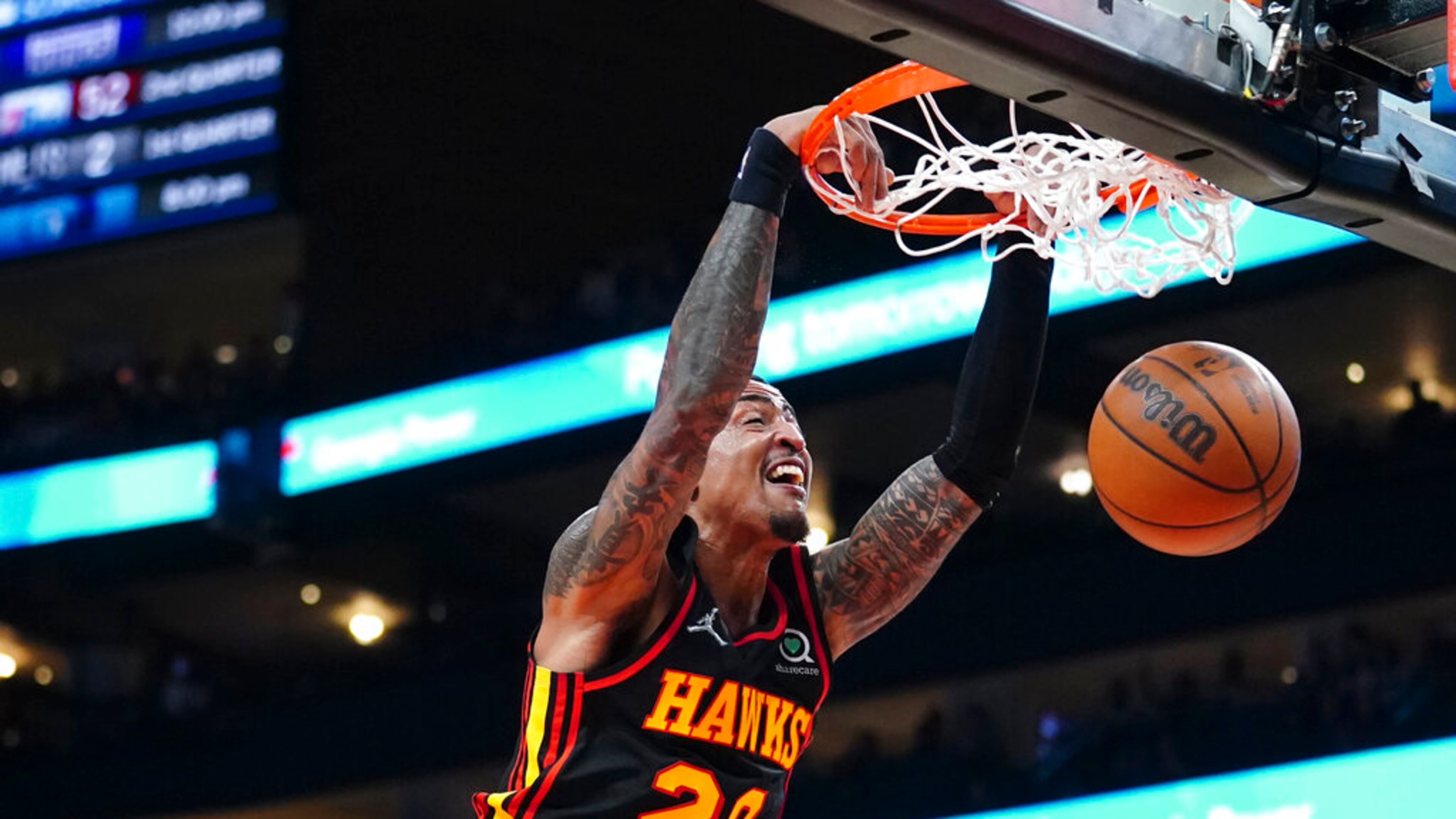 Hawks forward John Collins dunks during the first half against the Pacers earlier this season. Collins could give the Hawks a boost in the postseason because he is the team’s second-leading scorer (16.2 points per game) and rebounder (7.8 per game). (AP Photo/John Bazemore)