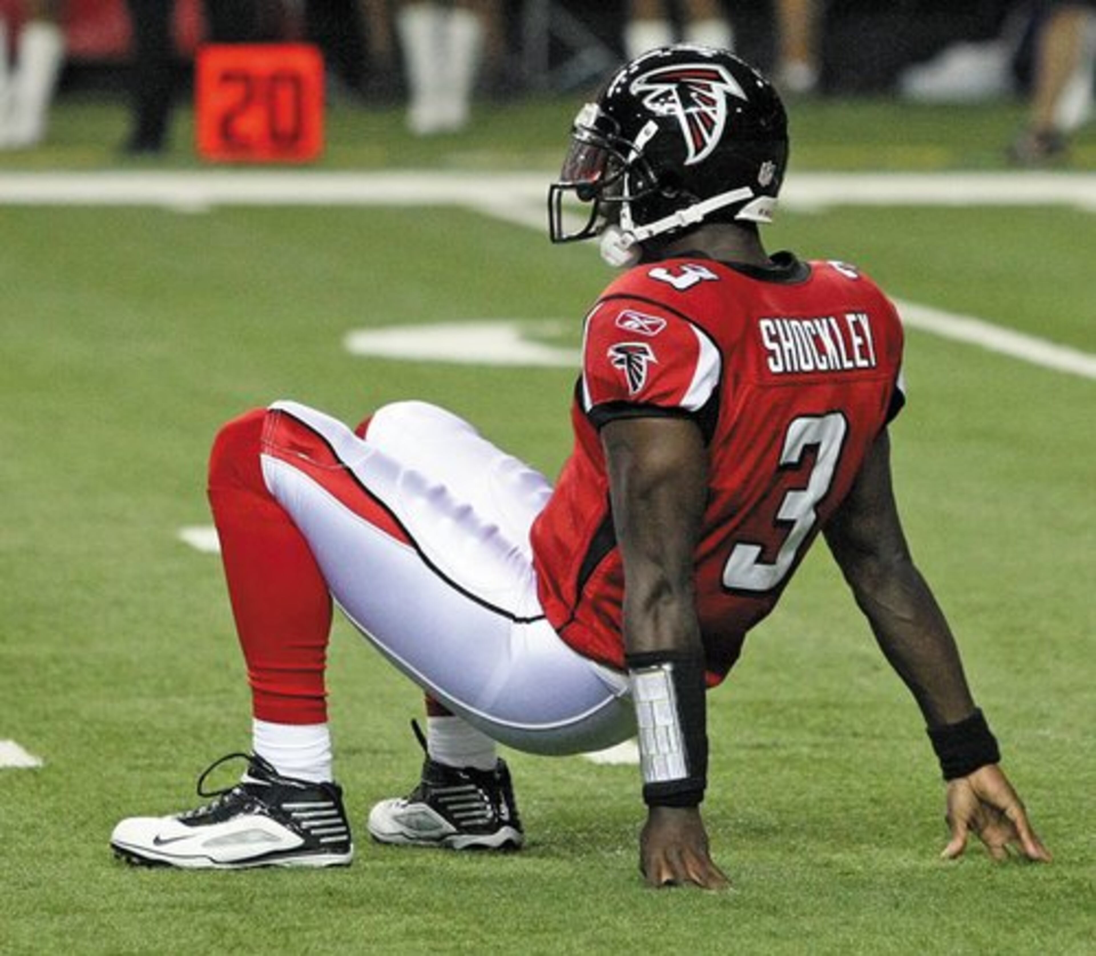 D.J. Shockley watches from the turf as his pass is intercepted.