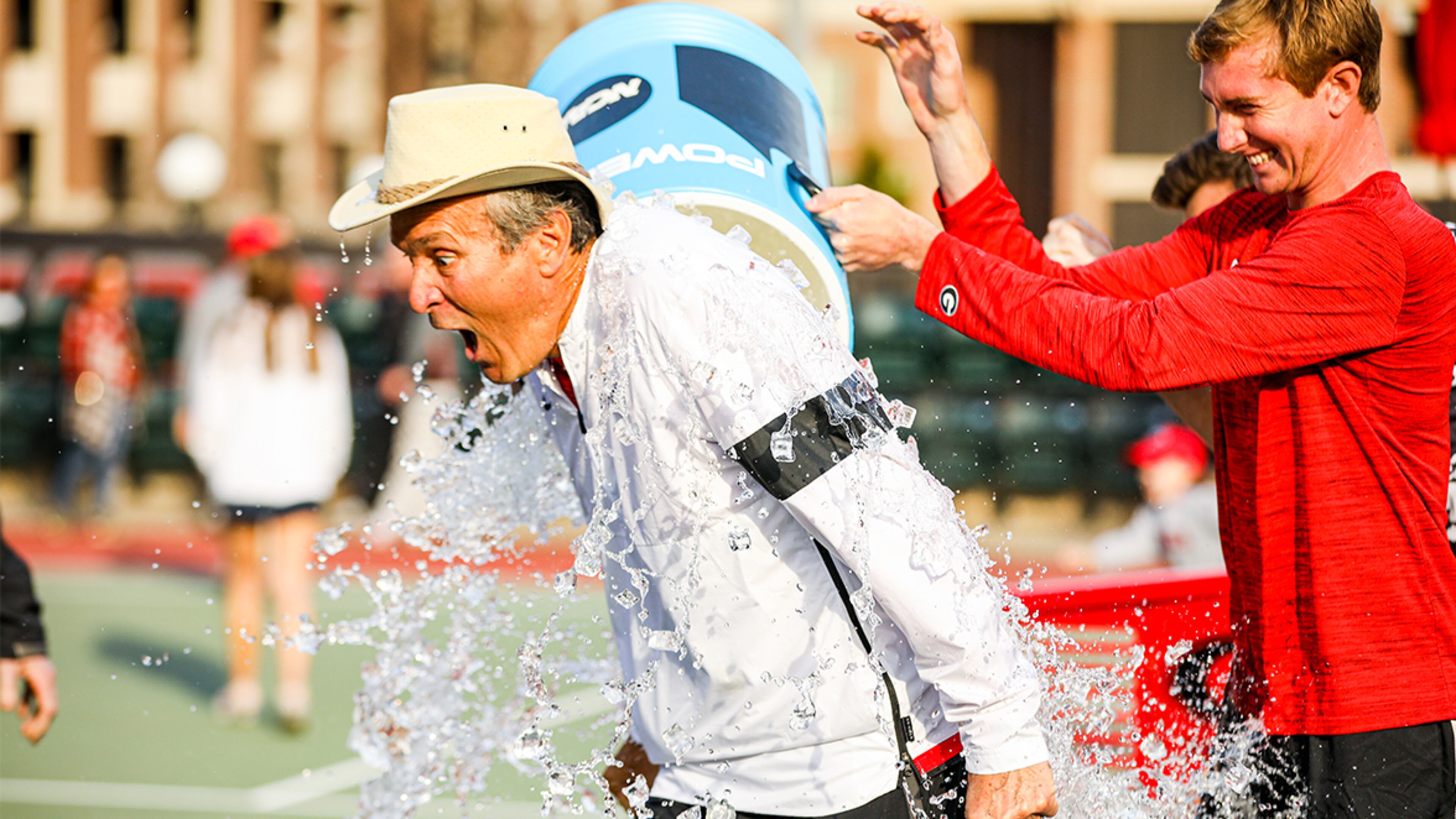 Georgia head coach Manuel Diaz celebrates win over Ohio State Sunday, March 1, 2020, on Mikael Pernfors Center Court at Henry Field Tennis Stadium at the Dan Magill Tennis Complex in Athens. It was Diaz's 707 career win.