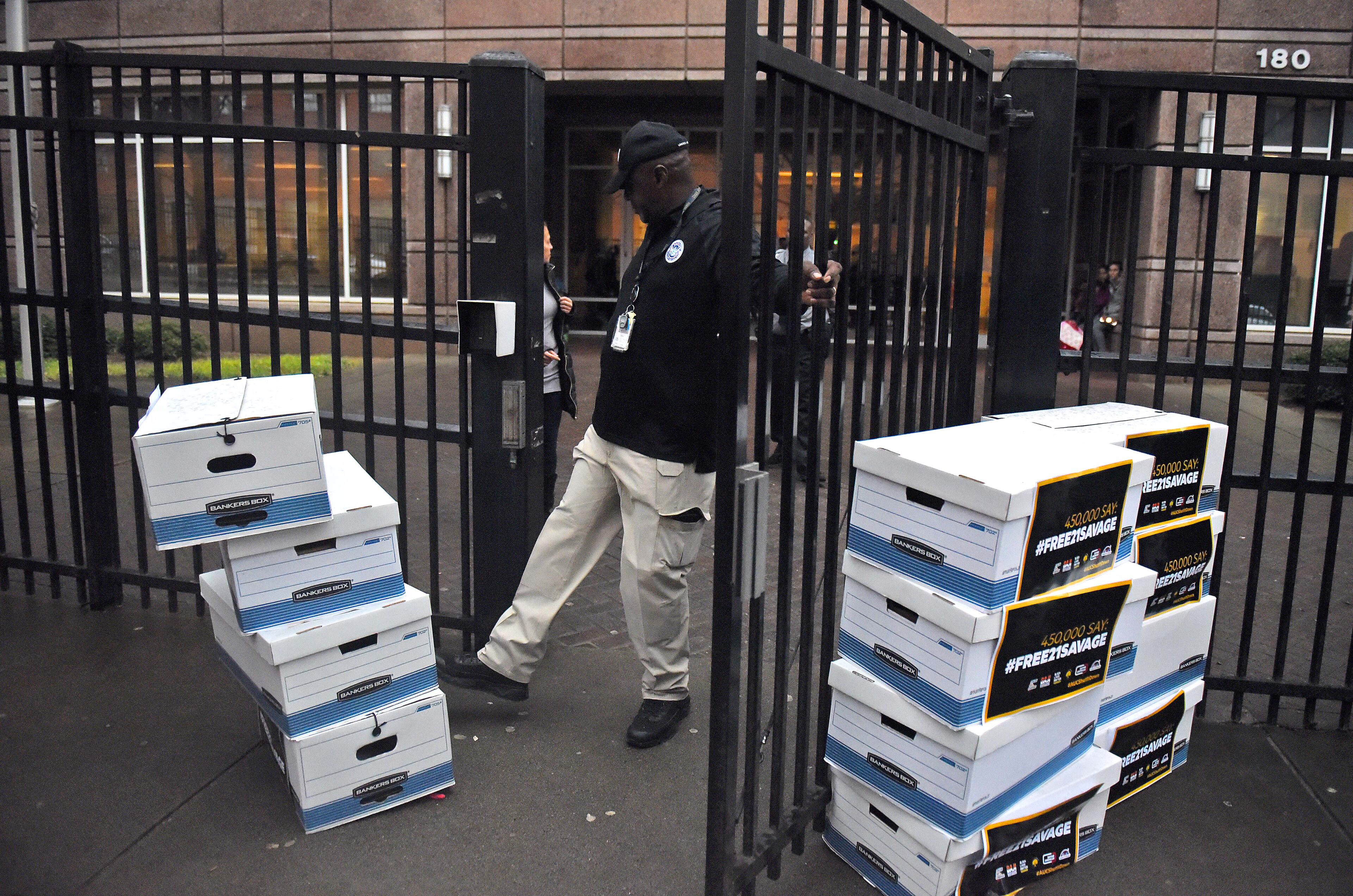 February 12, 2019 Atlanta - In order to clear a pathway outside the Atlanta Immigration Court, a gaurd kicks aside several boxes with more than 445,000 petition signatures demanding the release of 21 Savage. U.S. Immigration and Customs Enforcement arrested the Grammy-nominated rapper the morning of February 3, claiming that he is actually from the United Kingdom and overstayed his visa. Ten organizations, including Color Of Change, delivered more than 445,000 petition signatures demanding the release of 21 Savage. RYON HORNE / RHORNE@AJC.COM