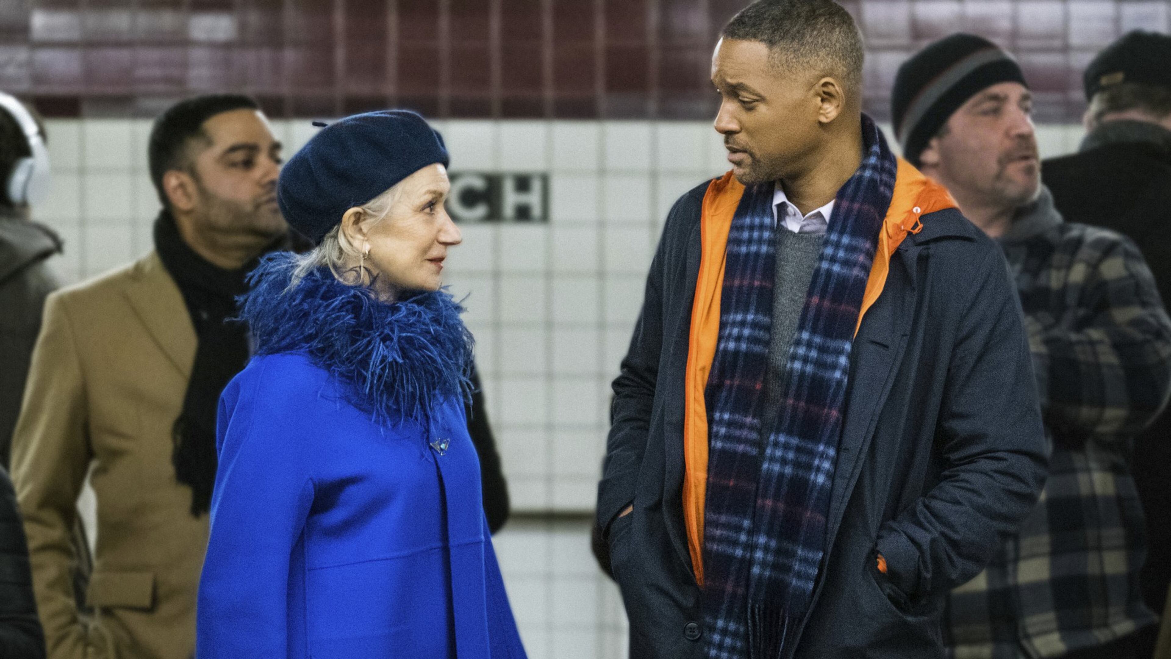 Helen Mirren (left) is a character from a theater company who confronts Will Smith on the street in “Collateral Beauty.” (Barry Wetcher/Warner Bros. via AP)