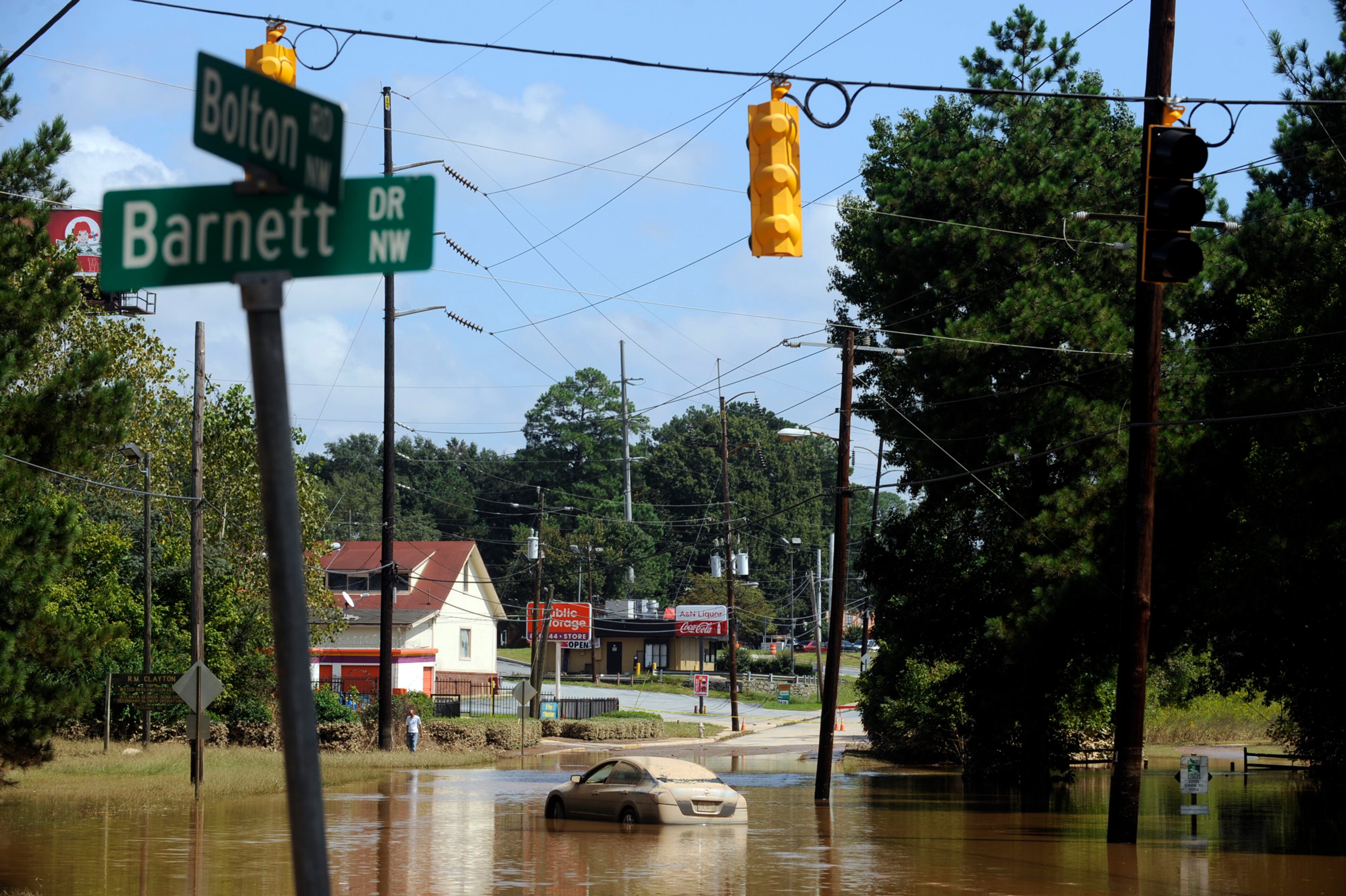 090922 Atlanta--A car still has a film of dirt on it after being submerged on Bolton Road in Atlanta Tuesday, Sep 22, 2009. Elissa Eubanks,eeubanks@ajc.com