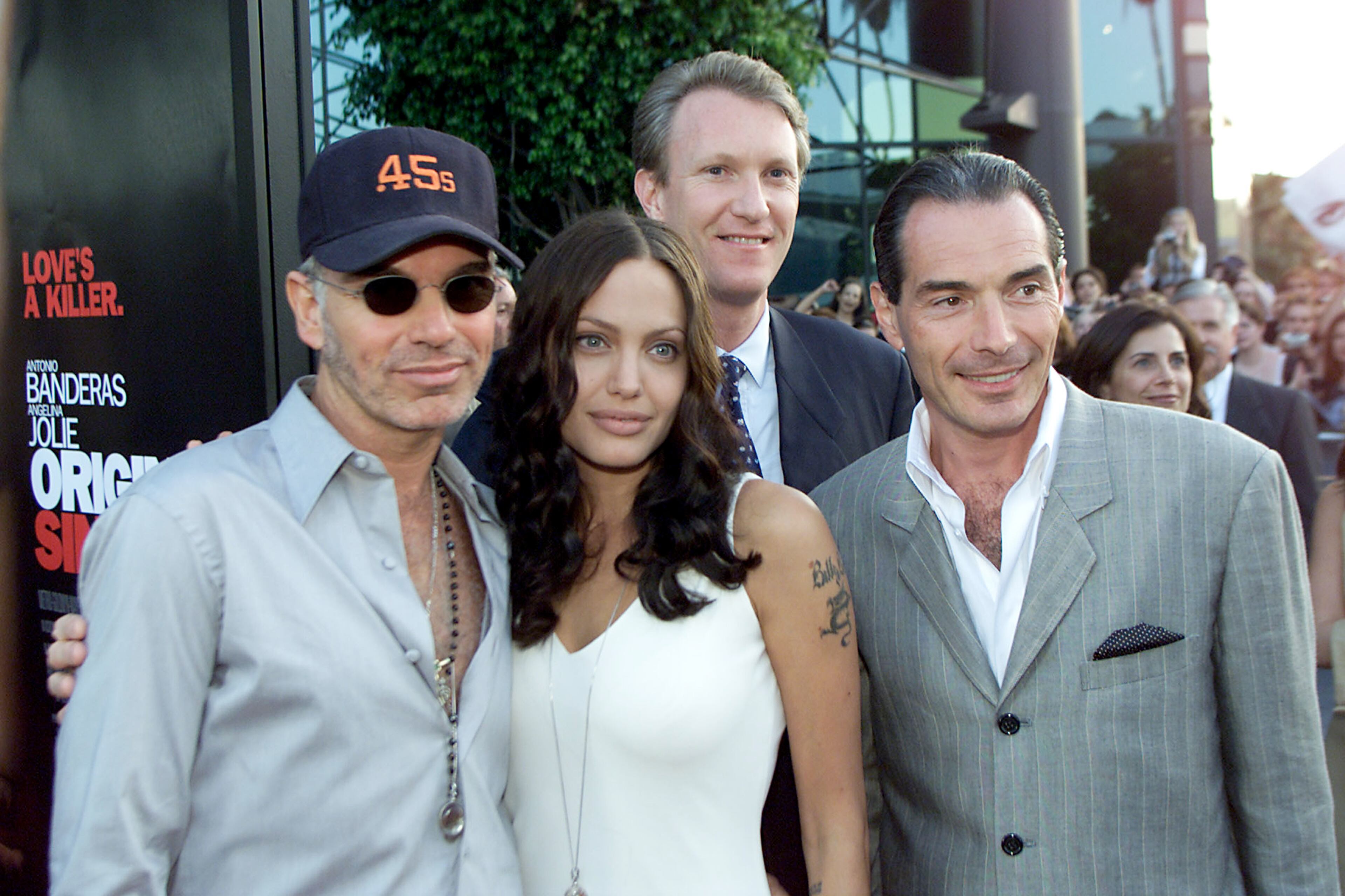 Left, Billy Bob Thornton, wife/cast member Angelina Jolie, vice president and COO of MGM, Inc., Chris McGurk and chairman and CEO of MGM, Inc., Alex Yemenidjian before the 'Original Sin' premiere held at DGA Theater in Los Angeles, CA., Tues., July 31, 2001. (photo by Kevin Winter/Getty Images)