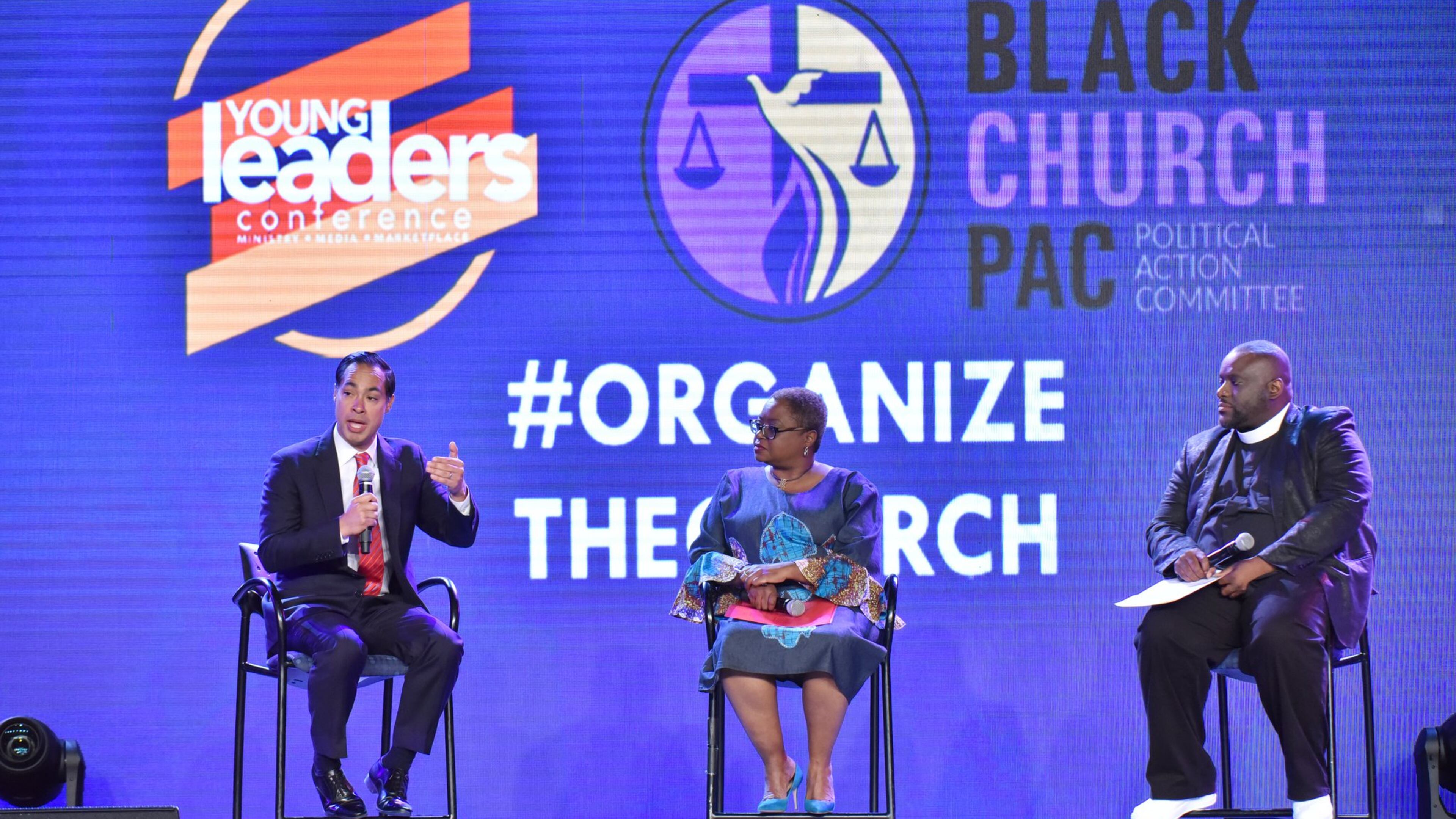 Democratic presidential candidate Julian Castro (left) speaks Friday as Pastor Leah Daughtry and Pastor Michael McBride, co-founders of the Black Church PAC, interview him during the 2020 Presidential Candidate Forum at the Young Leaders Conference at the Georgia International Convention Center. Two other White House hopefuls, Cory Booker and Pete Buttigieg, also spoke Friday at the conference. (Hyosub Shin / Hyosub.Shin@ajc.com)