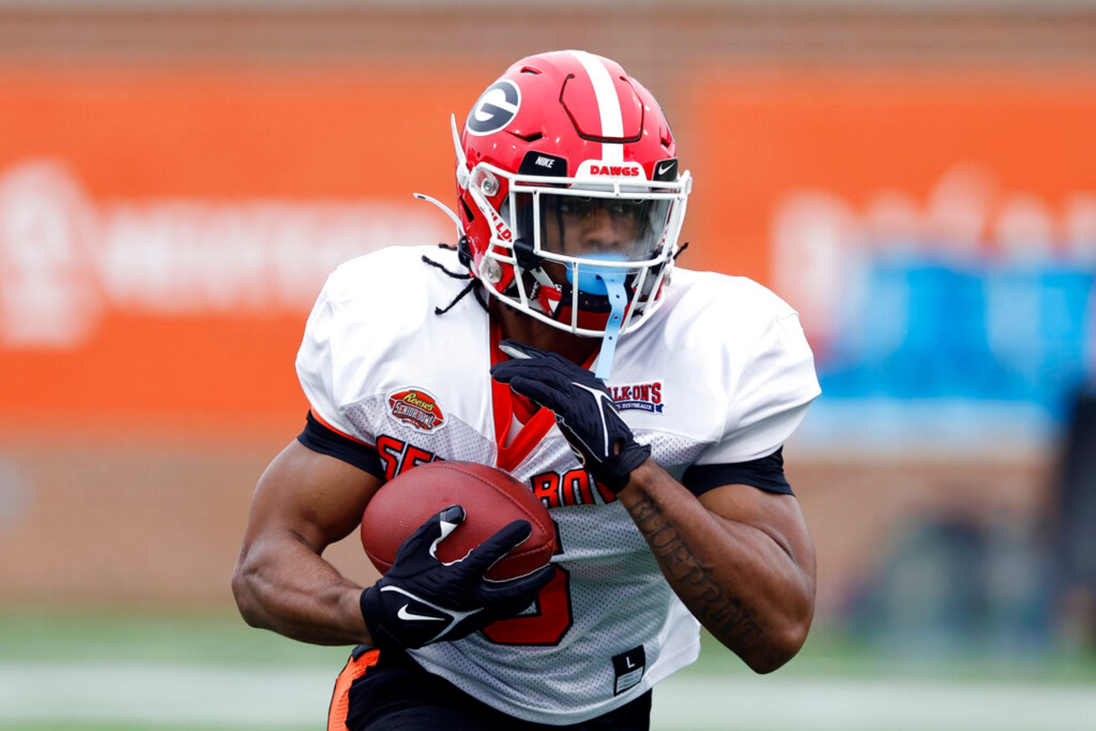 American running back Kenny McIntosh of Georgia (6) runs through drills during practice for the Senior Bowl NCAA college football game Thursday, Feb. 2, 2023, in Mobile, Ala.. (AP Photo/Butch Dill)